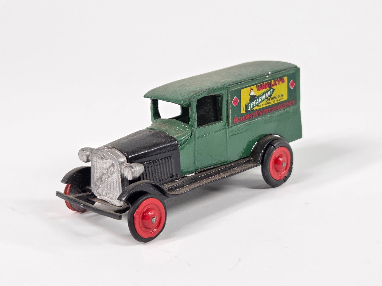 RECAST TOOTSIETOY CHEVROLET WRIGLEY'S GUM TRUCK: REMAINS IN FAIR TO GOOD CONDITION. TRUCK TWISTED. DUSTY, NEEDING CLEANED.
