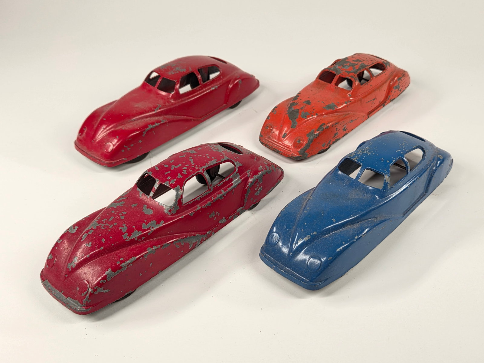 4) JANE FRANCIS CAST METAL STREAMLINE CARS: ALL REMAIN IN FAIR TO GOOD CONDITION, SHOWING PAINT WEAR.