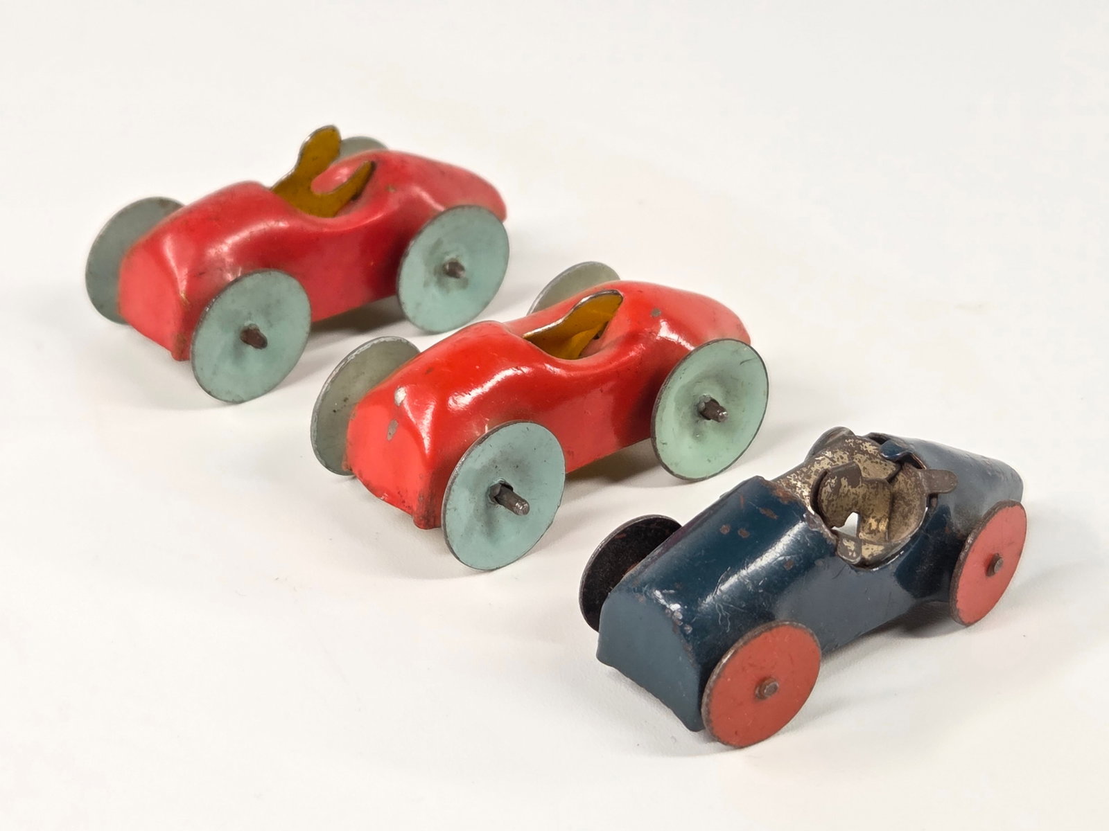 3) SMALL MINIATURE PRESSED STEEL RACE CARS: ALL REMAIN IN FAIR TO GOOD CONDITION, SHOWING SOME TYPICAL WEAR.