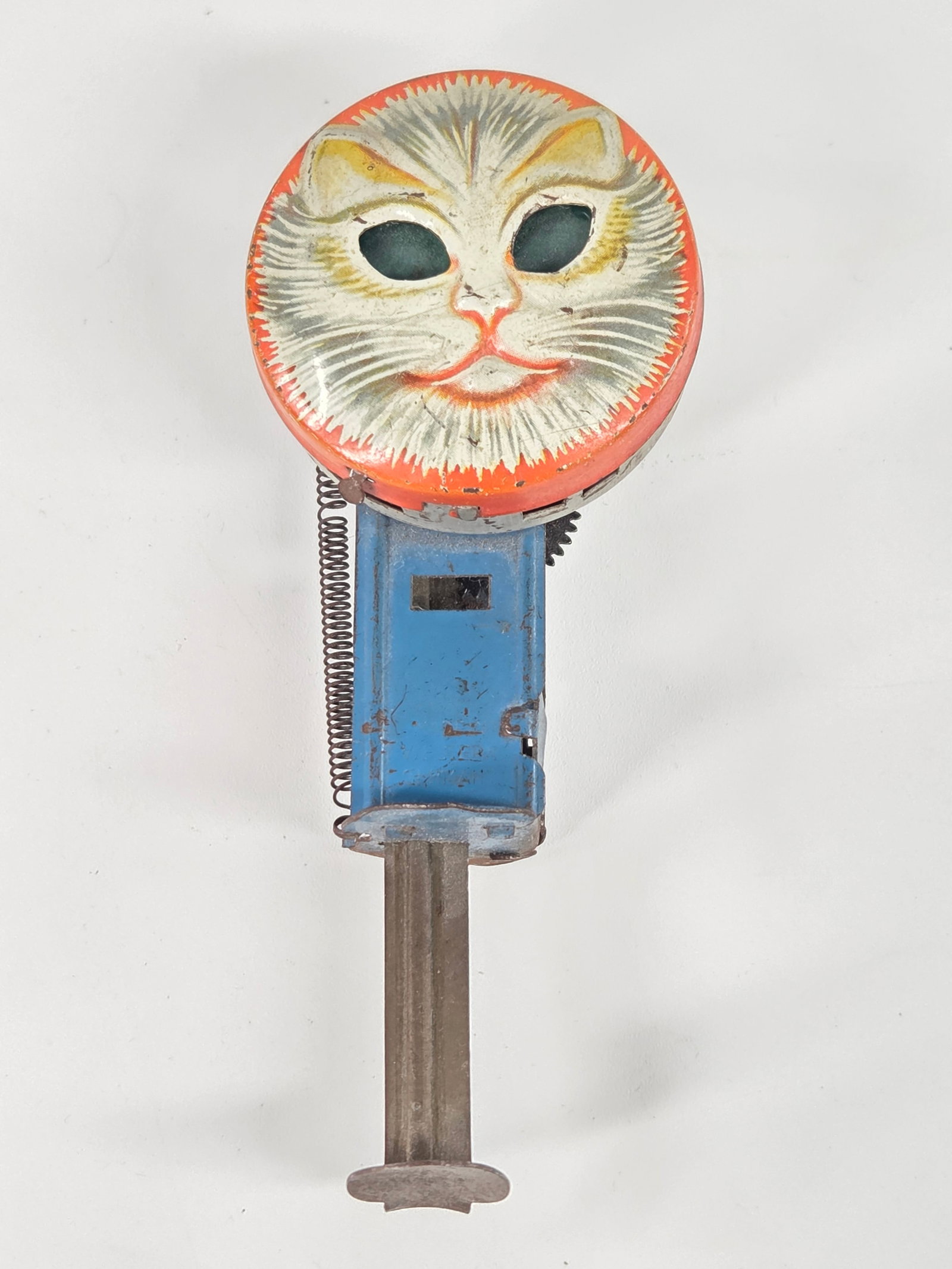VINTAGE TIN LITHO CAT SPARKLER TOY: REMAINS IN FAIR TO GOOD CONDITION, SHOWING SOME TYPICAL WEAR. DOES NOT SPARK.
