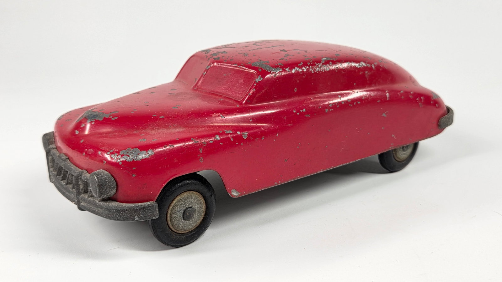 J&S PRODUCTS. METAL STREAMLINE CAR: REMAINS IN GOOD CONDITION, SHOWING SOME TYPICAL WEAR.