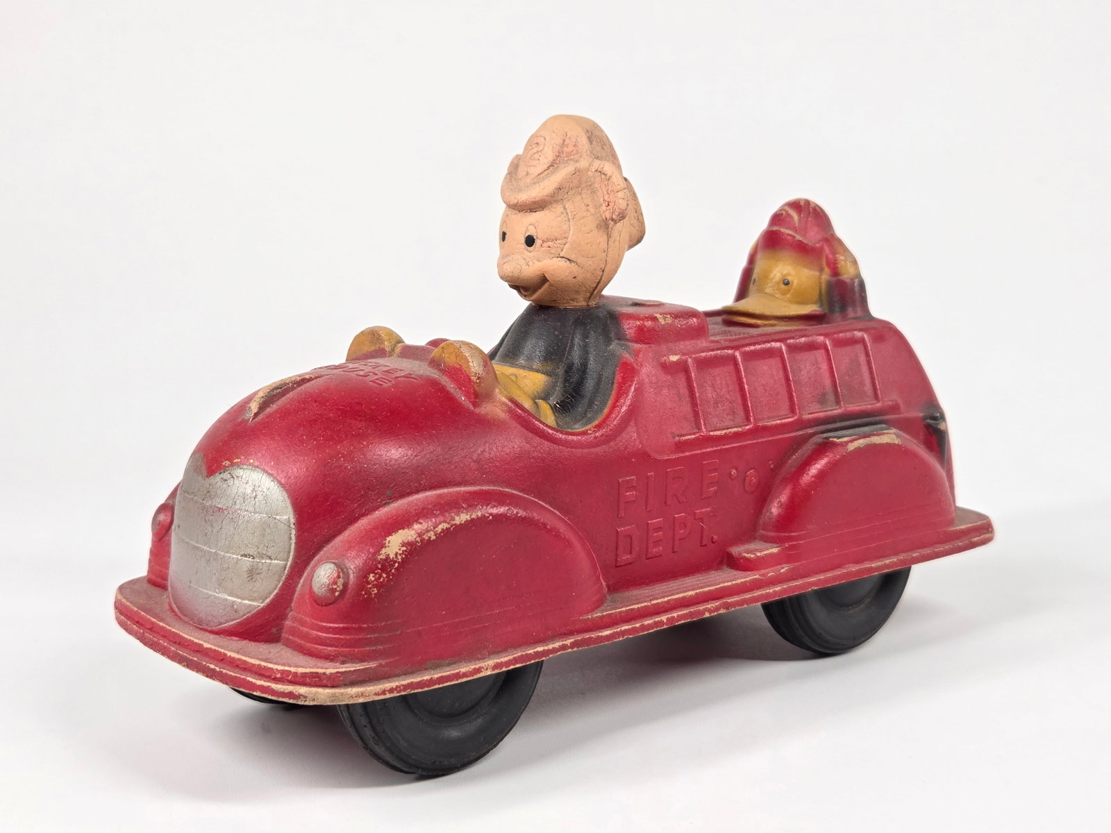 SUN RUBBER MICKEY MOUSE FIRE ENGINE: REMAINS IN GOOD CONDITION, SHOWING SOME TYPICAL WEAR.