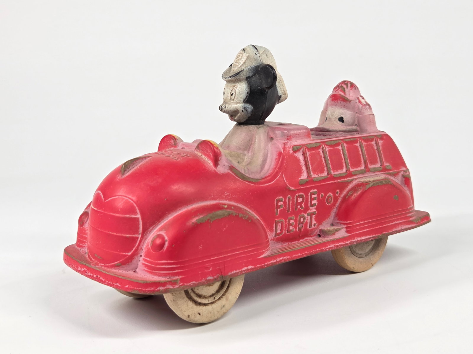 SUN RUBBER MICKEY MOUSE FIRE ENGINE: REMAINS IN GOOD CONDITION, SHOWING SOME TYPICAL WEAR.