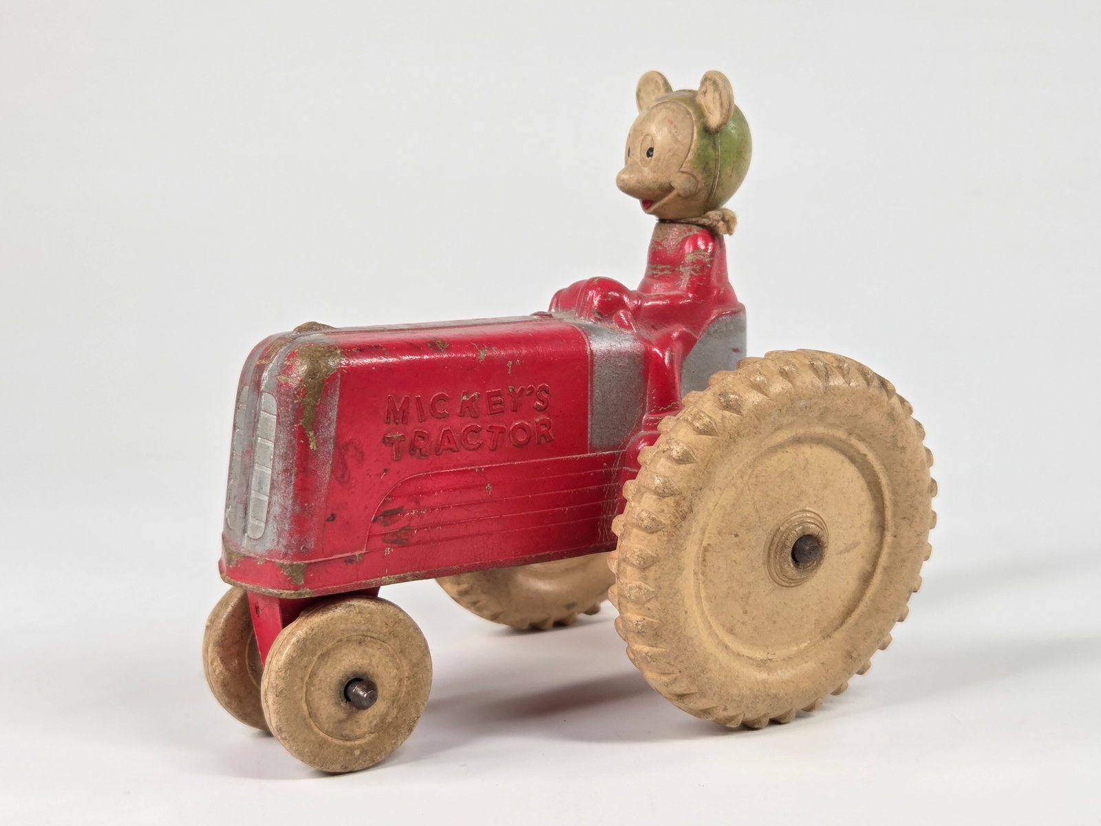 SUN RUBBER MICKEY MOUSE FARM TRACTOR: REMAINS IN GOOD CONDITION, SHOWING SOME TYPICAL WEAR.
