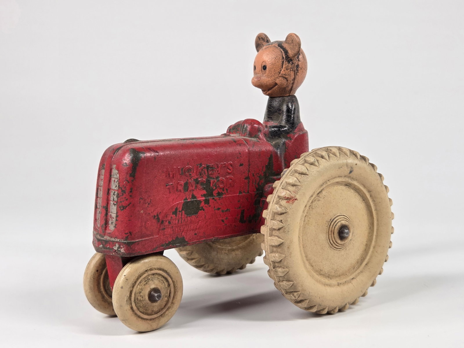 SUN RUBBER MICKEY MOUSE FARM TRACTOR: REMAINS IN GOOD CONDITION, SHOWING SOME TYPICAL WEAR.