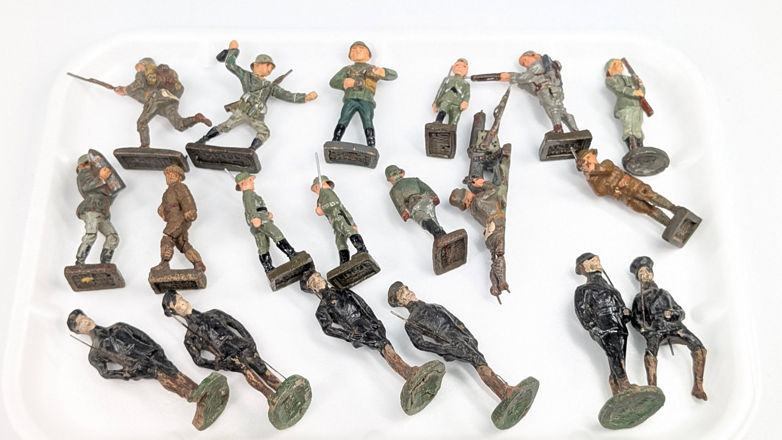 VARIOUS ANTIQUE GERMAN COMPOSITION SOLDIERS: ALL REMAIN IN FAIR TO GOOD CONDITION, SHOWING SOME TYPICAL WEAR. SOME SHOWING MORE WEAR THAN OTHERS.