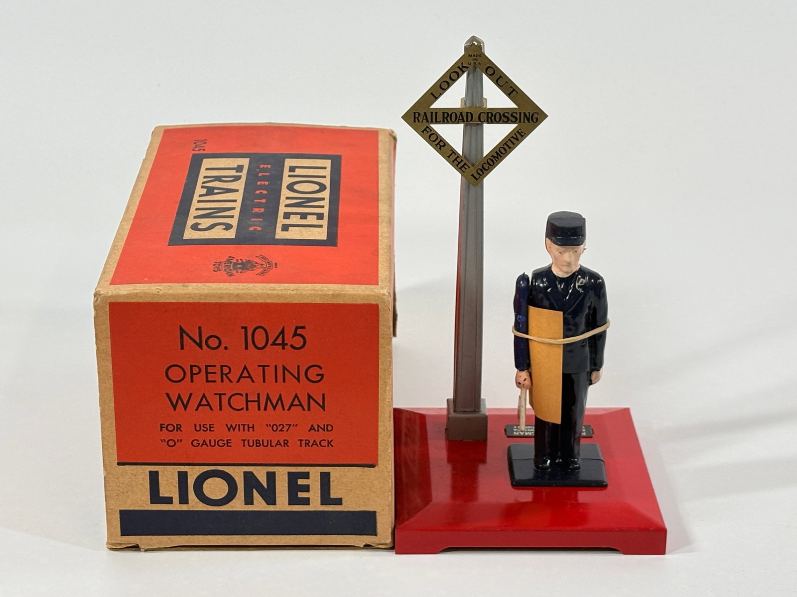 LIONEL O GAUGE NO. 1045 OPERATING WATCHMAN W/ BOX: REMAINS IN GOOD CONDITION WITH BOX.