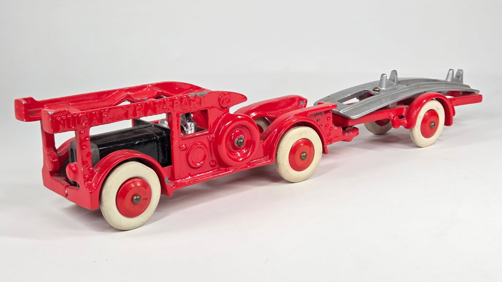 RESTORED HUBLEY CAST IRON NUCAR TRANSPORT: REMAINS IN GOOD CONDITION, SHOWING SOME PAINT WEAR.