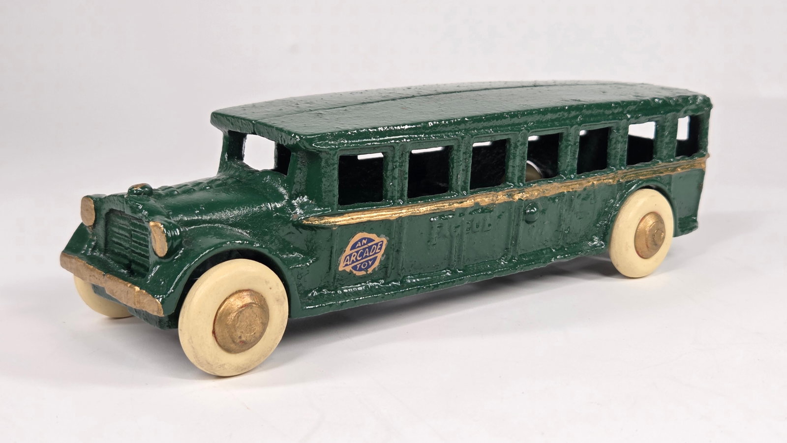 RESTORED ARCADE CAST IRON FAGEOL COACH BUS: REMAINS IN GOOD RESTORED CONDITION, SHOWING SOME WEAR.