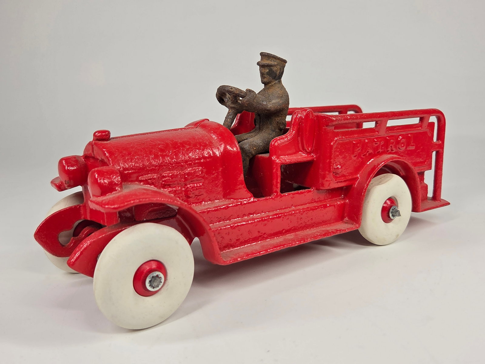 PAINTED ANTIQUE CAST IRON PATROL VEHICLE (1 of 5)