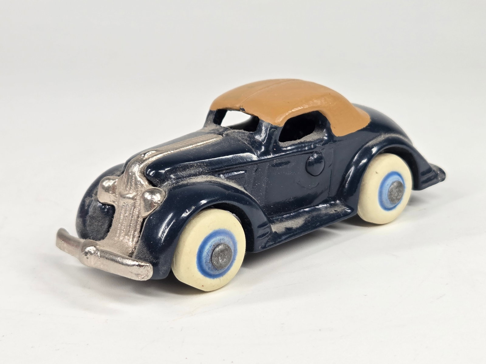 CUSTOM HAND PAINTED CAST IRON RECAST SEDAN: REMAINS IN VERY GOOD CONDITION, SHOWING SOME LIGHT WEAR. DUSTY, NEEDING CLEANED.