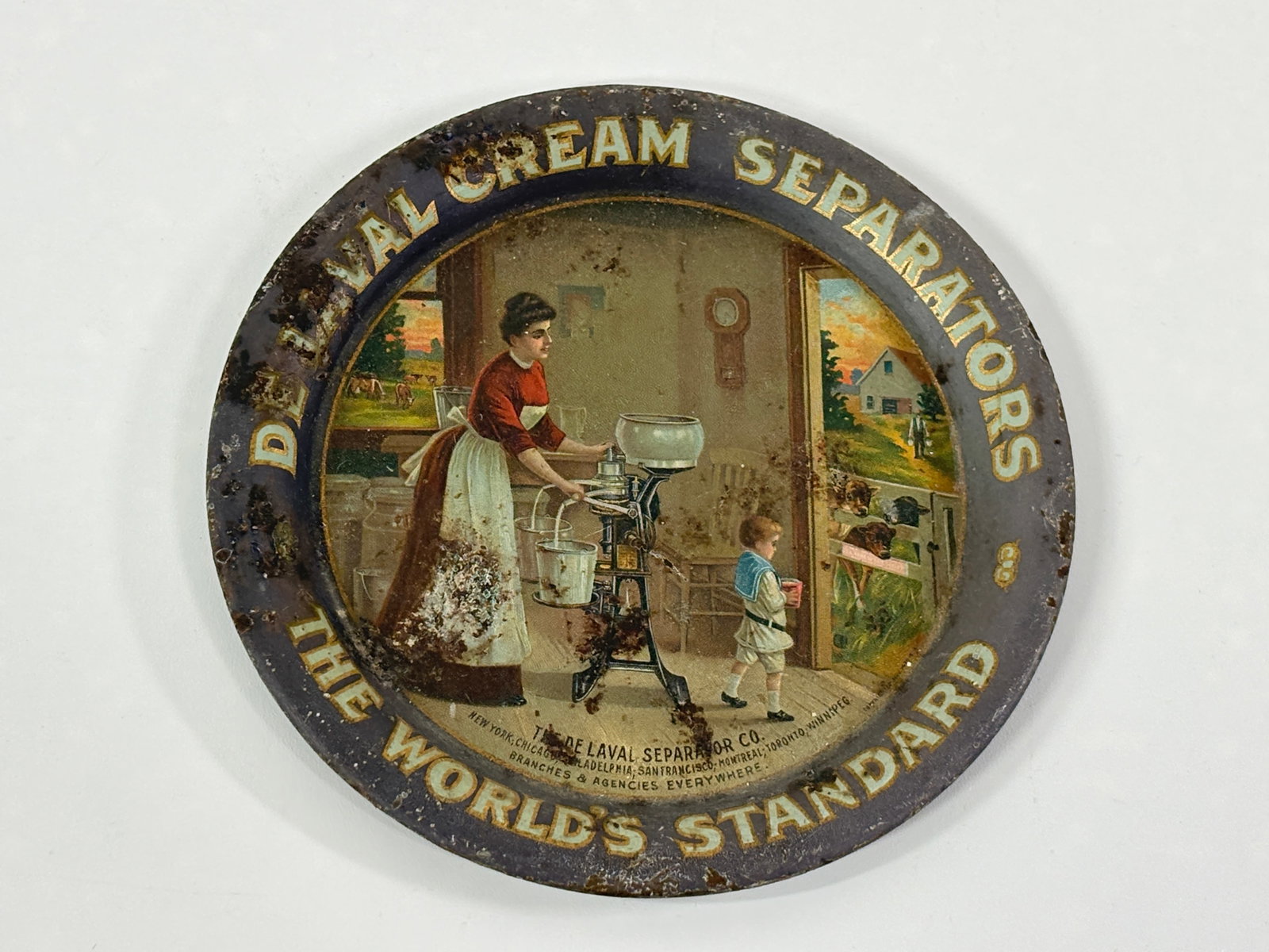 DE LAVAL CREAM SEPARATOR ADVERTISING COIN TRAY (1 of 2)