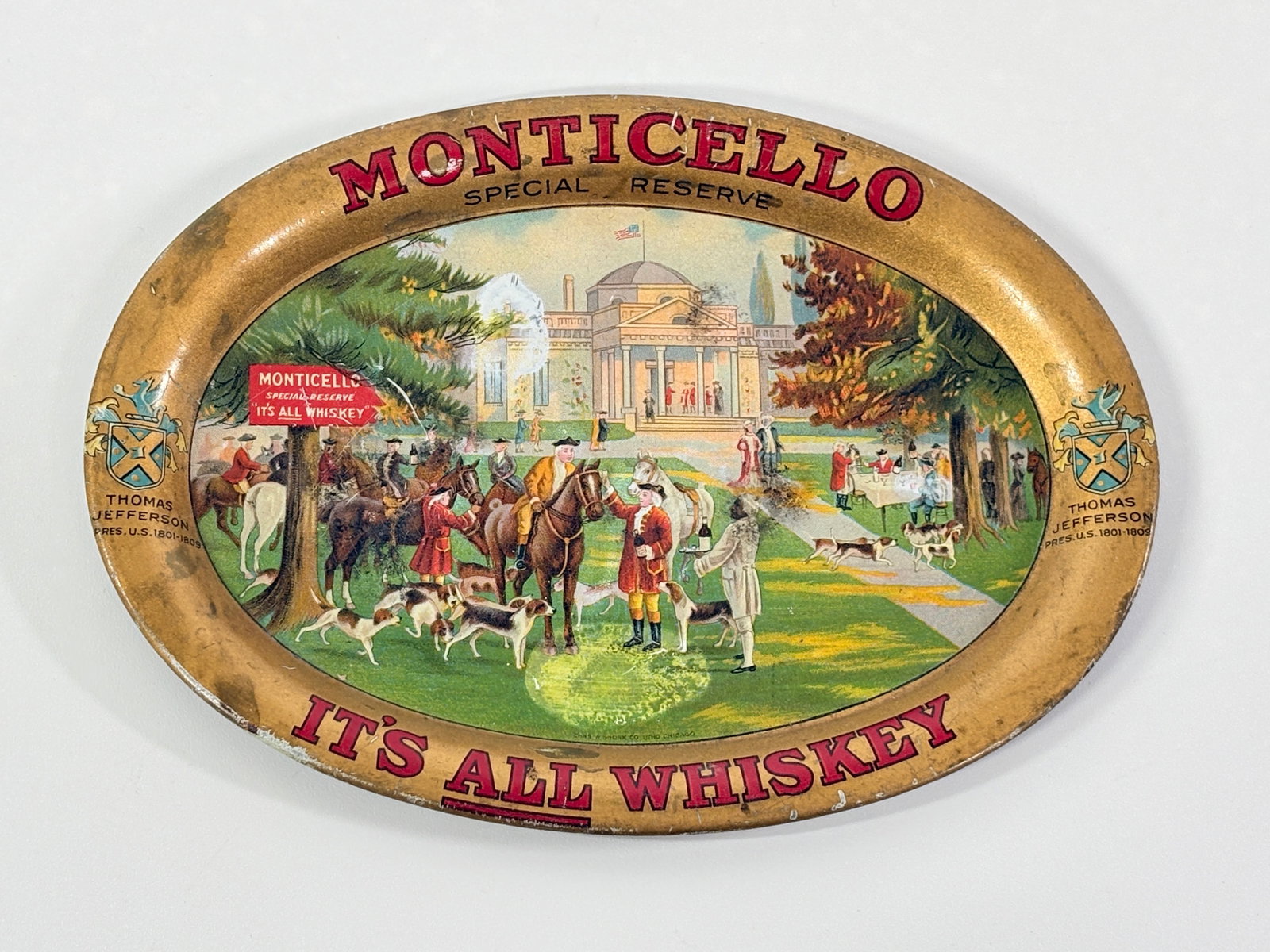 MONTICELLO SPECIAL RESERVE ALL WHISKEY OVAL ADVERTISING COIN TRAY: PROMOTIONAL ADVERTISING COIN TRAY FOR MONTICELLO WHISKEY - REMAINS IN GOOD CONDITION WITH LIGHT-MODERATE GENERAL WEAR/SCRATCHES