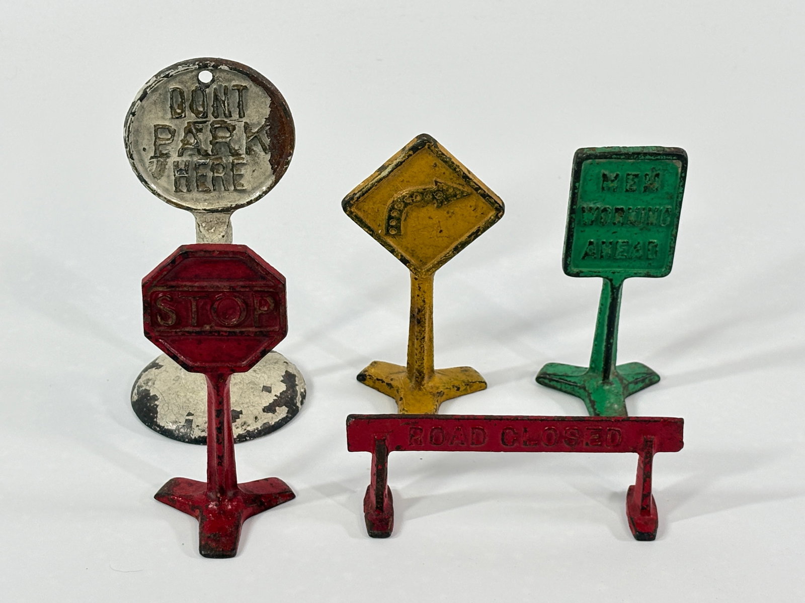 5) ASSORTED PAINTED CAST IRON TOY ROAD SIGNS (1 of 6)