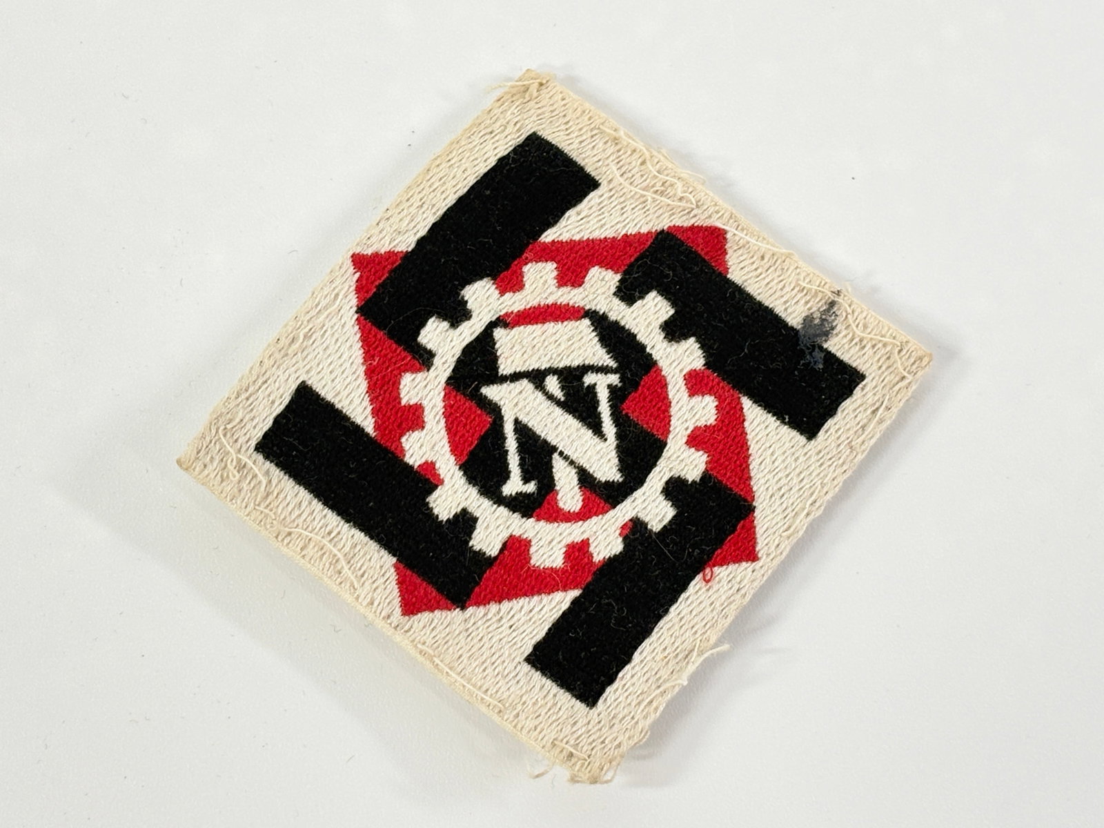 WWII ERA GERMAN TENO TECHNICAL EMERGENCY CORPS PATCH: REMAINS IN GOOD CONDITION, SHOWING SOME WEAR ALONG THE EDGES.