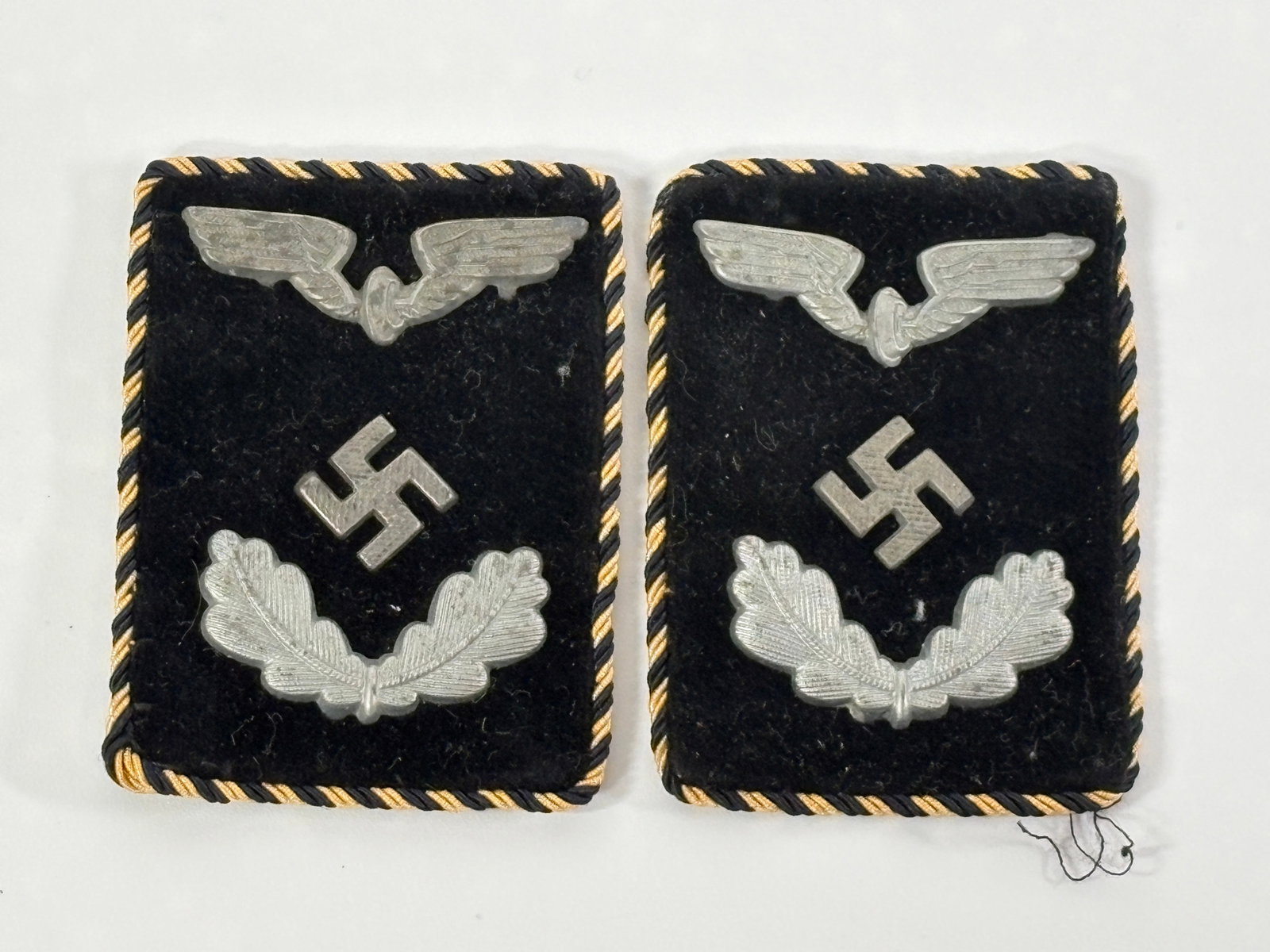 PAIR OF GERMAN WWII REICHSBAHN OFFICAL'S COLLAR TABS: BOTH REMAIN IN GOOD CONDITION, SHOWING SOME TYPICAL WEAR.
