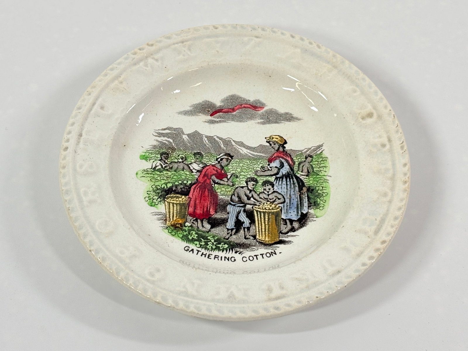 ANTIQUE STAFFORDSHIRE BLACK AMERICAN ABC PLATE: REMAINS IN GOOD CONDITION, SHOWING SOME TYPICAL WEAR. NO CHIPS OR CRACKS.
