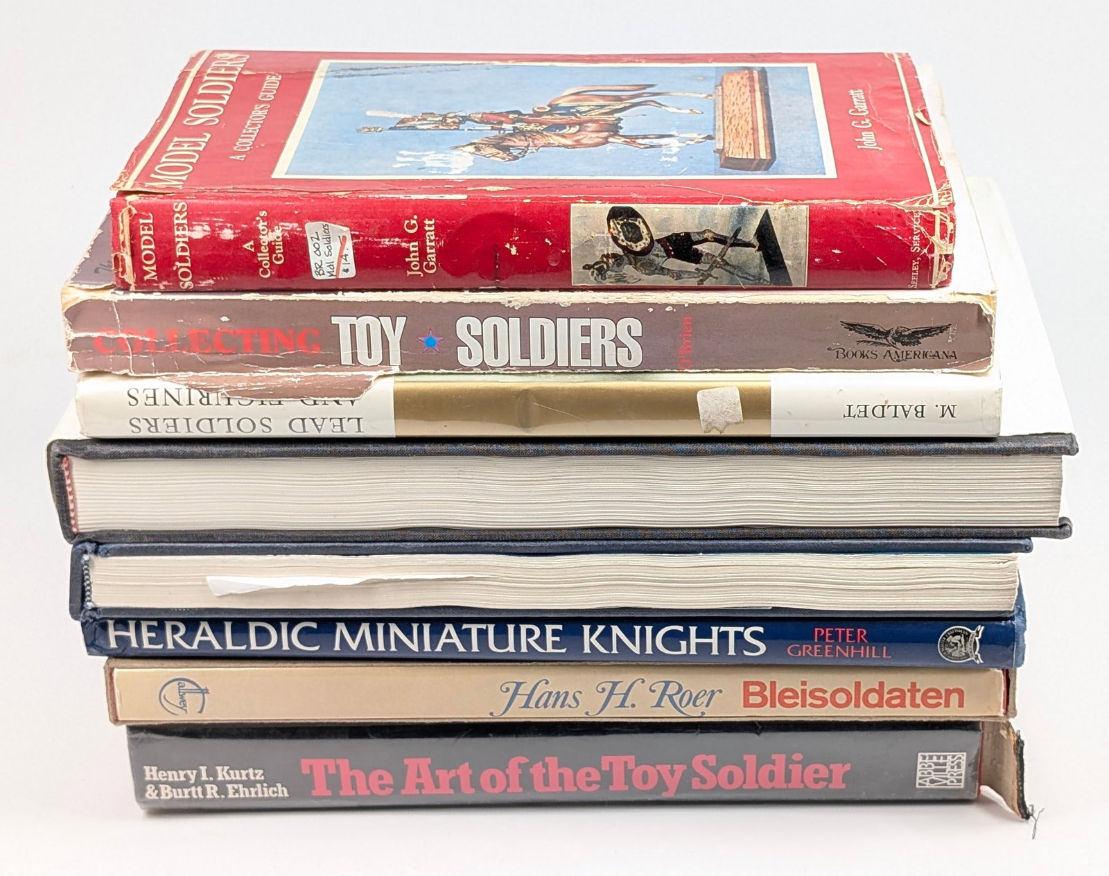 ASSORTMENT OF COLLECTIBLE TOY SOLDIER BOOKS: ALL REMAIN IN FAIR TO GOOD CONDITION, SHOWING TYPICAL USAGE WEAR.