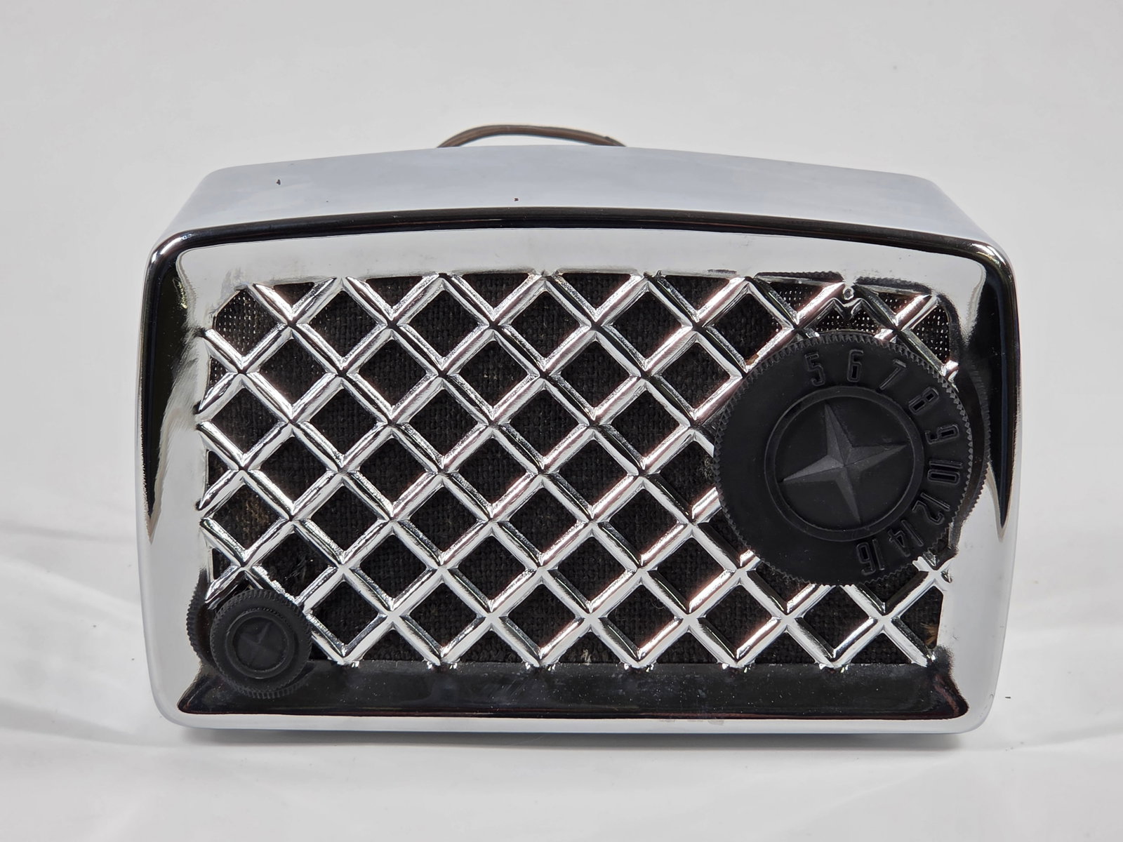 SEARS SILVERTONE 2002 CHROME METAL TUBE RADIO: REMAINS IN VERY GOOD CONDITION - SHINY. WORN CORD