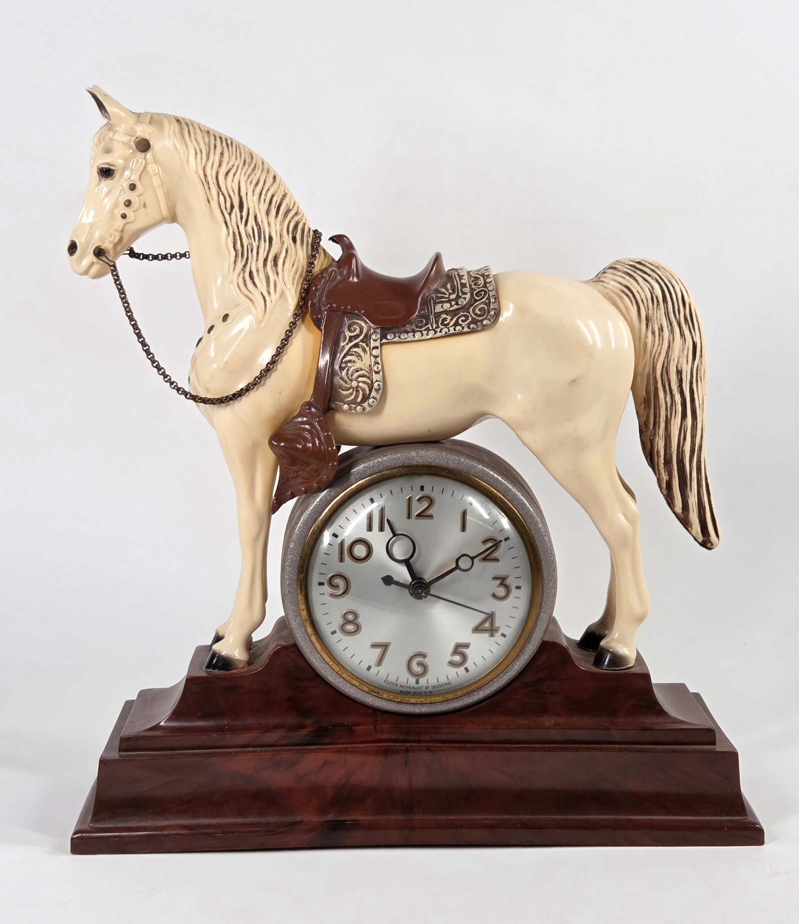 PAINTED METAL SADDLED HORSE MANTEL CLOCK SESSIONS: REMAINS IN VERY GOOD CONDITION WITH FEW SIGNS OF WEAR