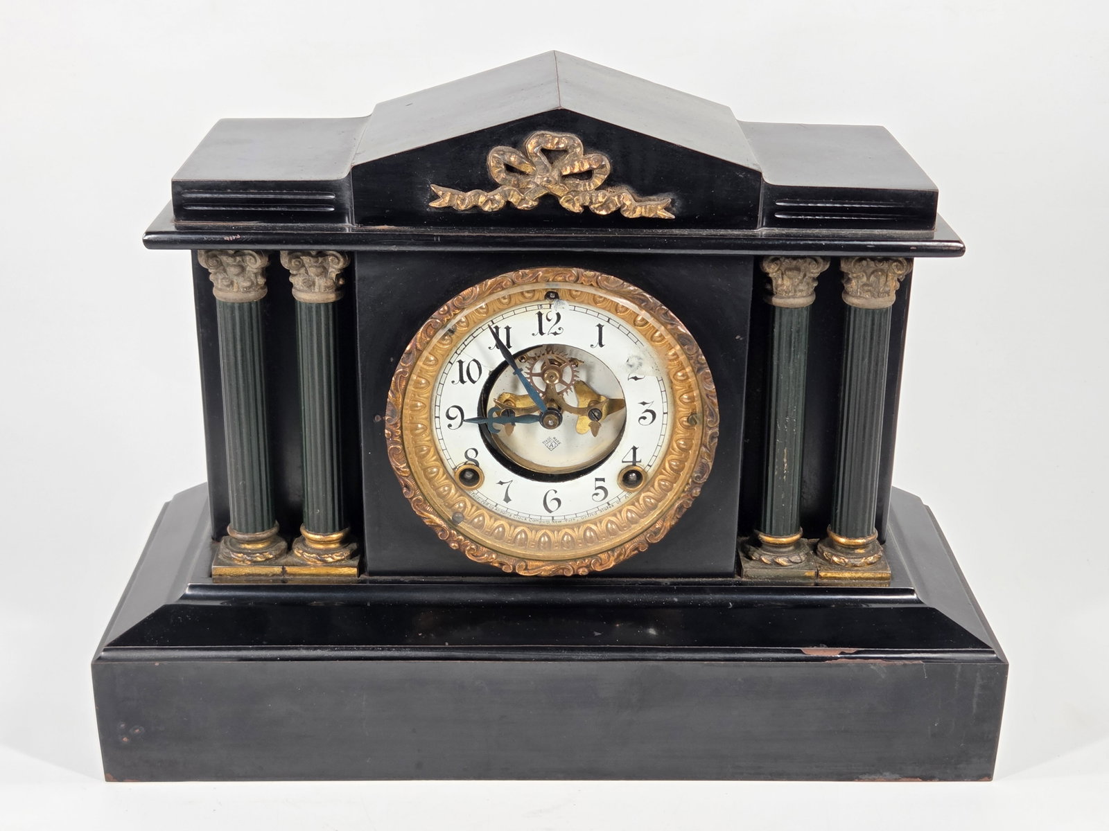 ANSONIA BLACK CAST IRON 4 COLUMN MANTEL CLOCK: CLOCK REMAINS IN VERY GOOD CONDITION WITH SOME LIGHT GENERAL WEAR