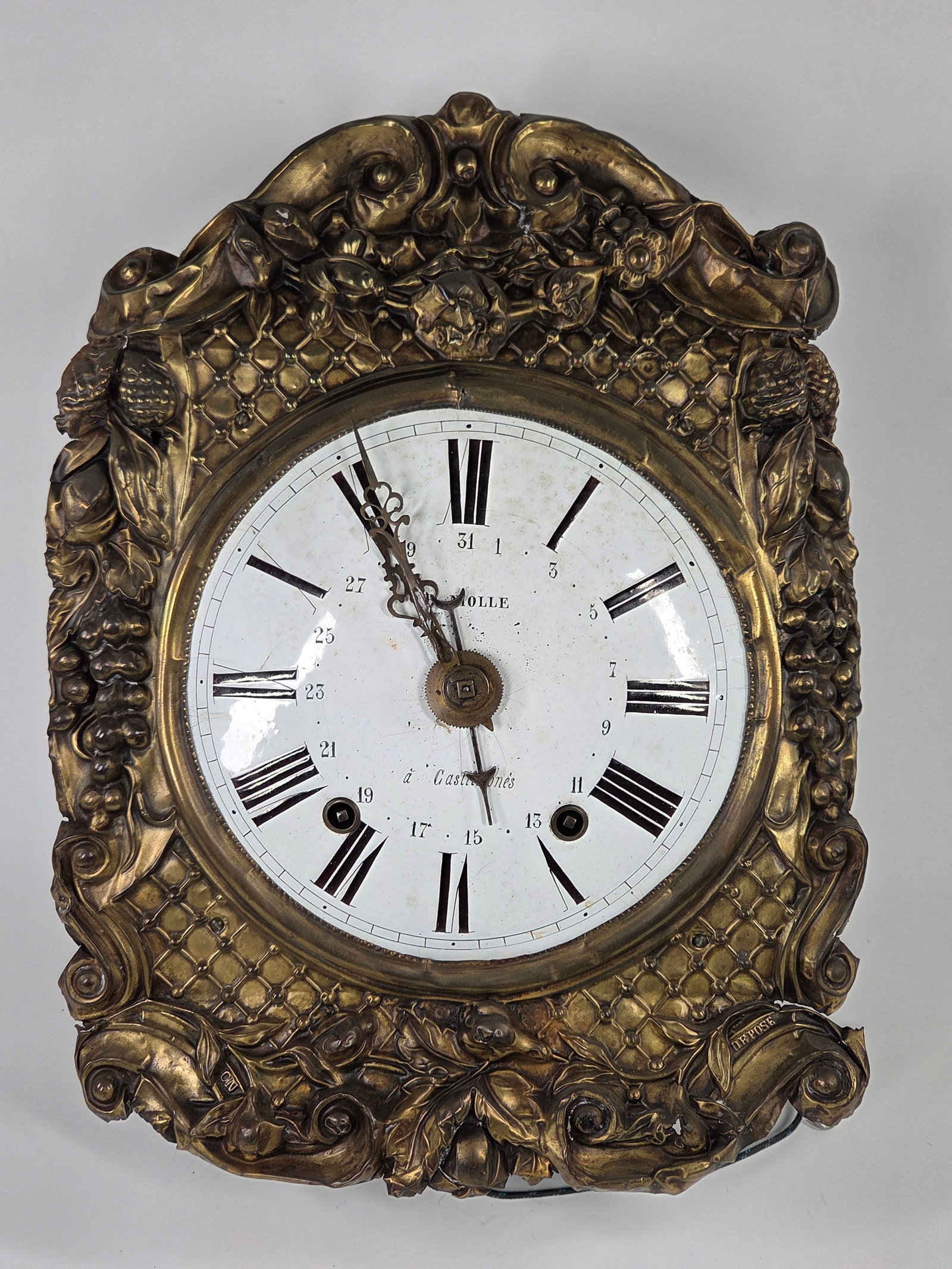 FRENCH BRASS FACE GRAPE & VINE WALL CLOCK W/ CHIME: ORNATE PRESSED BRASS FACE - PERIOD FRENCH MOVEMENT - COMTOISE, MORBIER. REMAINS IN VERY GOOD CONDITION WITH FEW MARKS - NO GLASS WITH MARKS TO SURROUND
