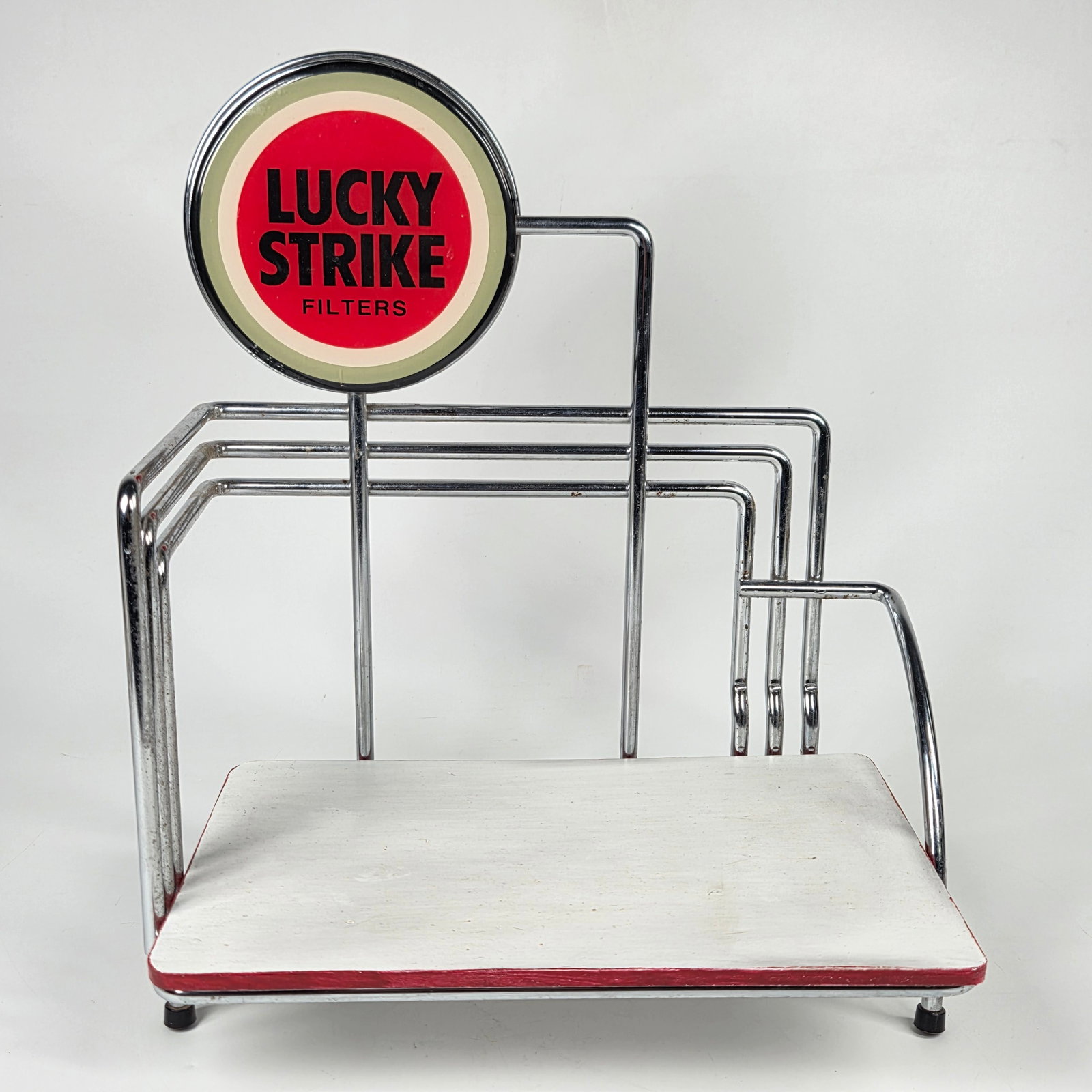 LUCKY STRIKE FILTERS CIGARETTE STORE COUNTER DISPLAY STAND: BRIGHT LOGO - REMAINS IN GOOD CONDITION WITH SOME LIGHT WEAR