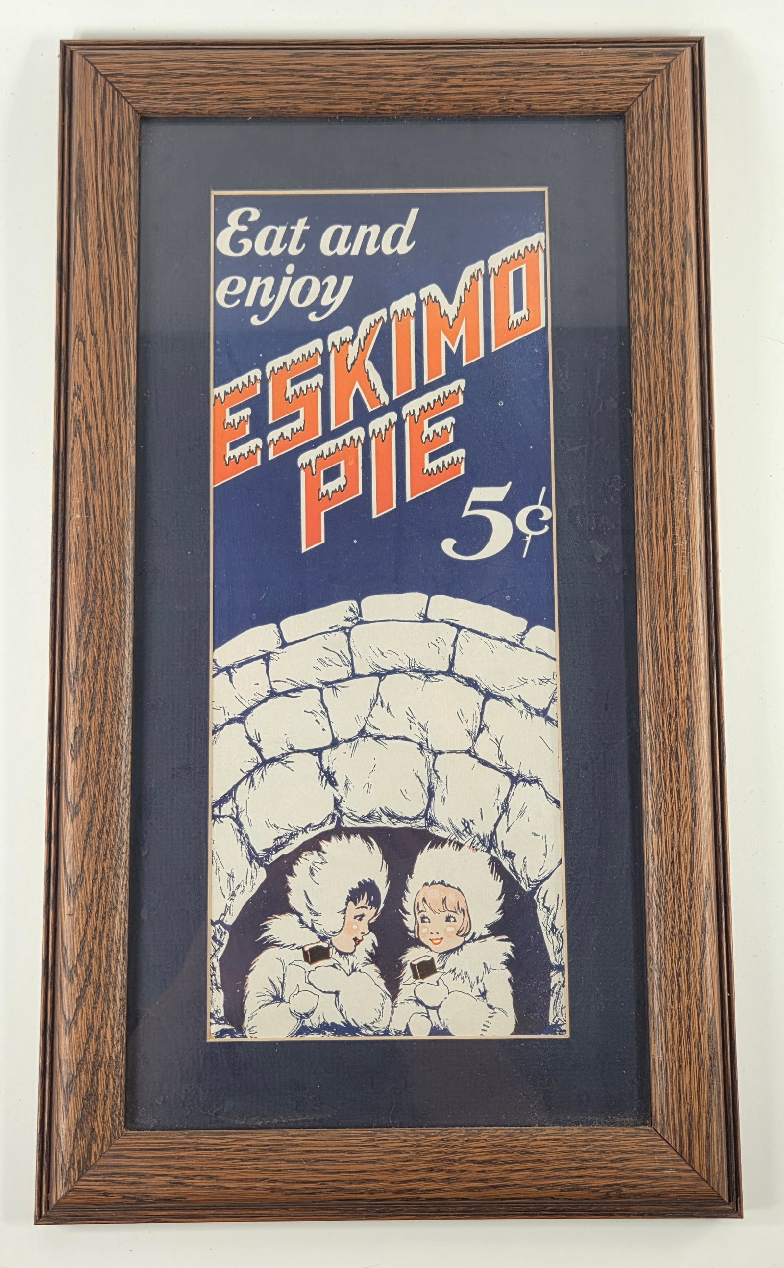 EAT & ENJOY ESKIMO PIE FRAMED ADVERTISING IGLOO PRINT: REMAINS IN VERY GOOD CONDITION - FRAMED