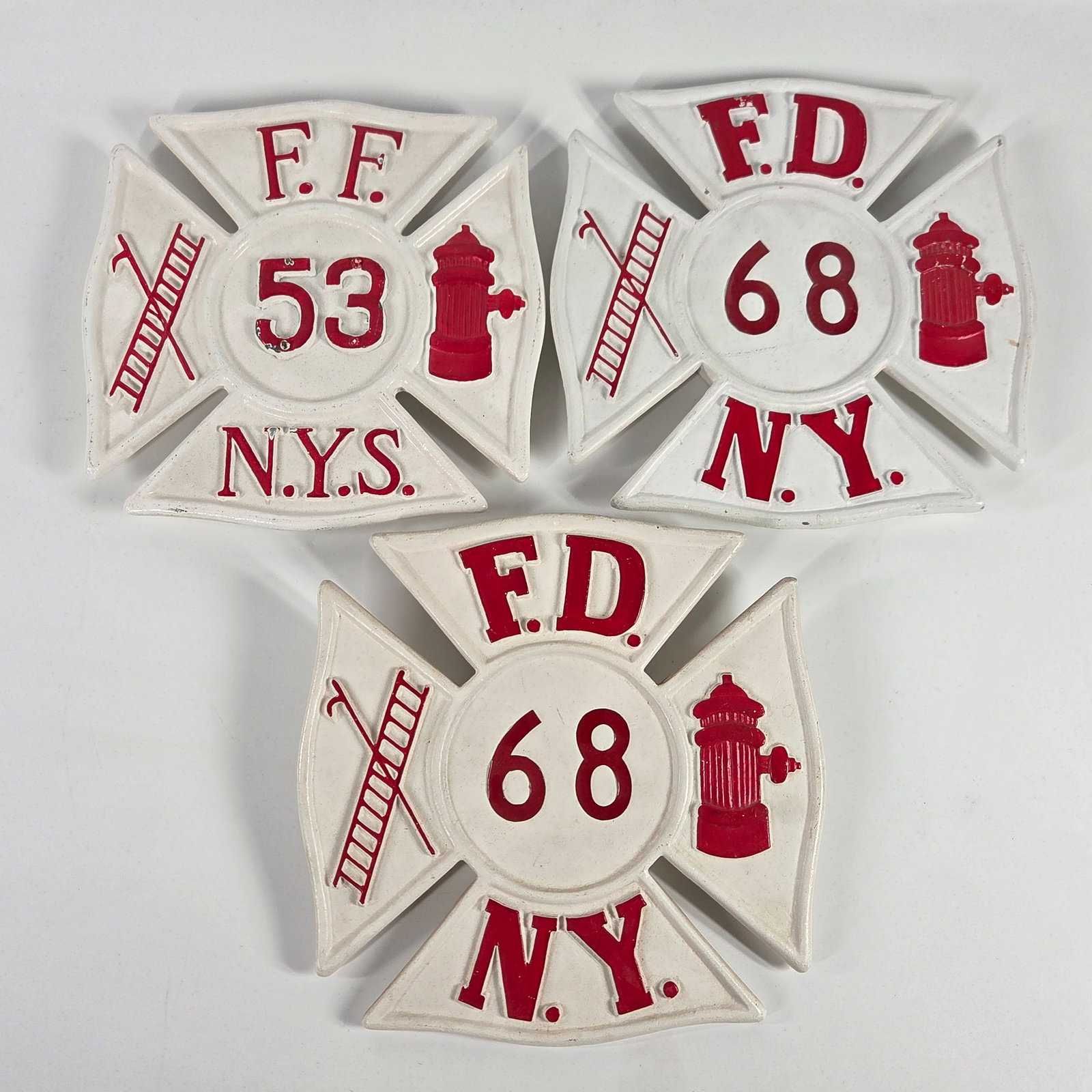 3) VINTAGE CAST METAL FIREFIGHTERS MALTESE CROSS FDNY FFNY: GROUP REMAINS IN VERY GOOD CONDITION WITH SOME LIGHT WEAR