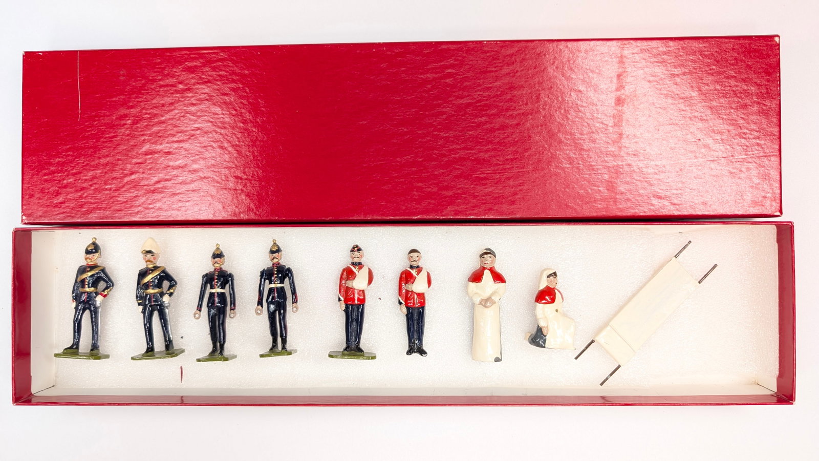 G.B.E. WOUNDED SOLDIER SET W/ NURSE: SET REMAINS IN VERY GOOD CONDITION. CUSTOM BOX.