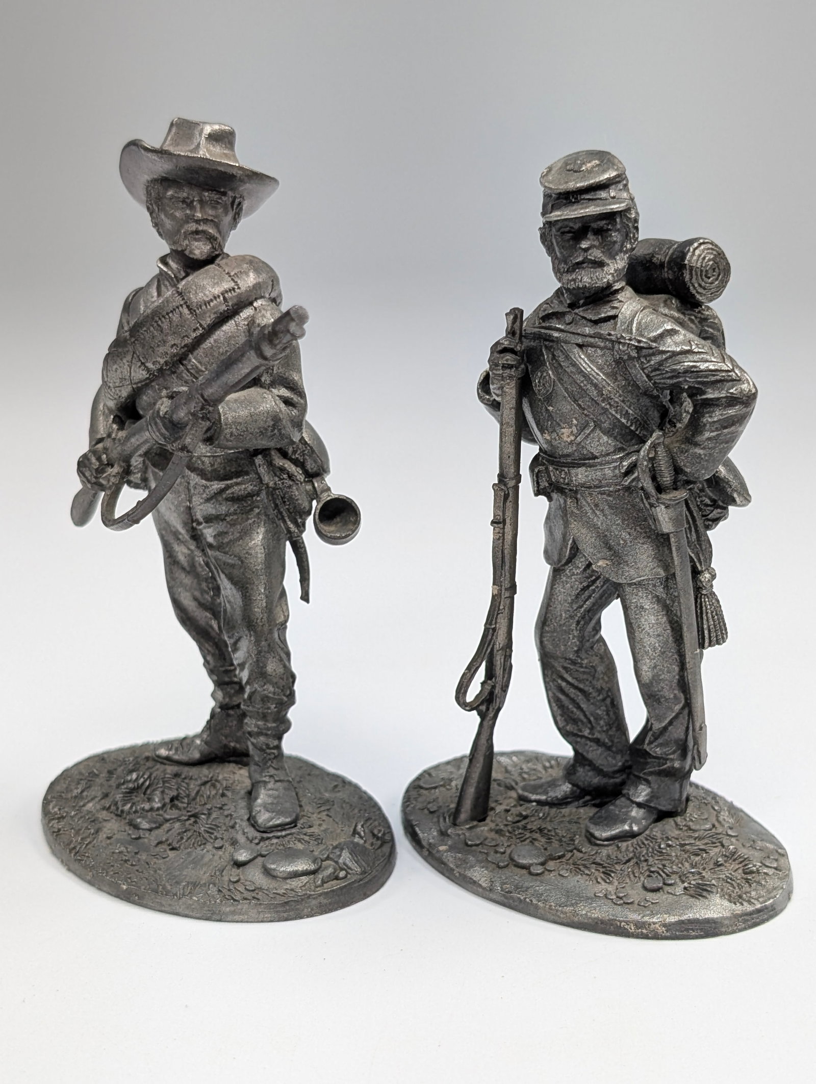 PAIR OF KIRK PEWTER US MILITARY SOLDIERS: BOTH REMAIN IN GOOD CONDITION, SHOWING SOME LIGHT TYPICAL WEAR.