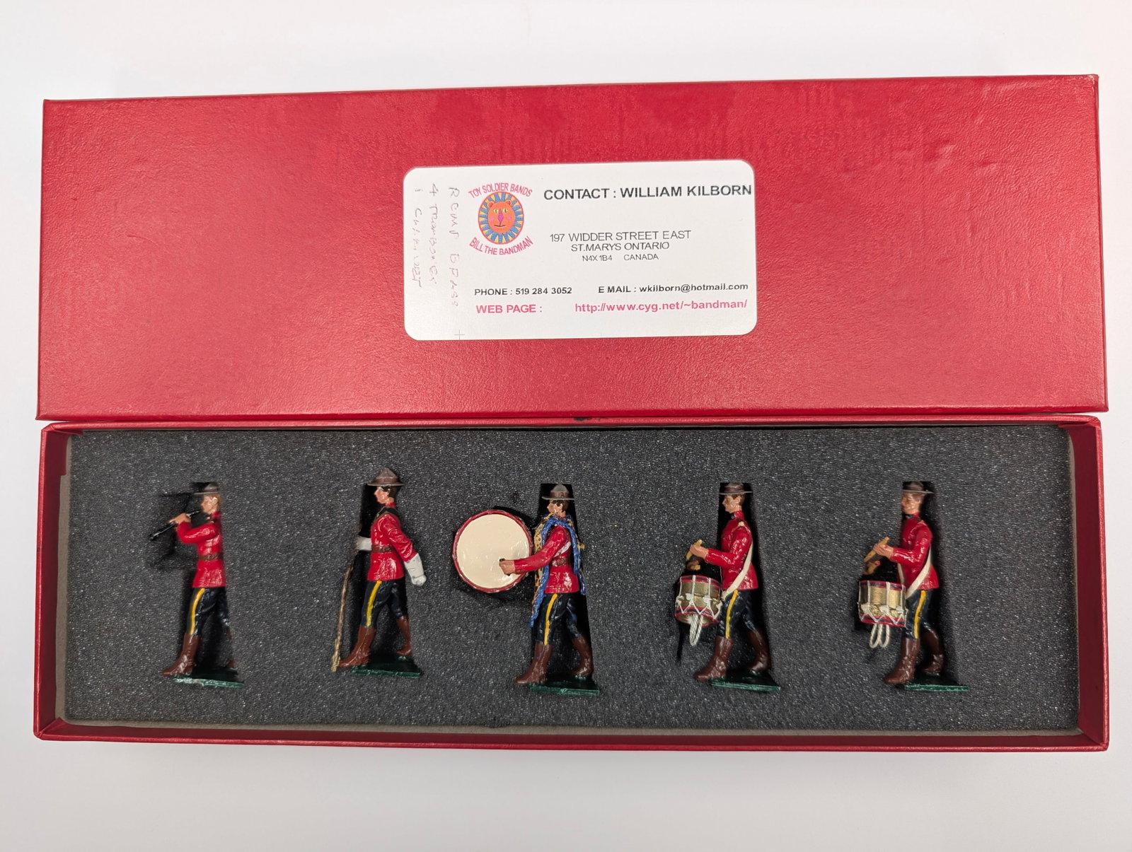 BILL THE BANDMAN CANADIAN MOUNTIE BAND: SET REMAINS IN GOOD CONDITION, SHOWING SOME LIGHT WEAR.