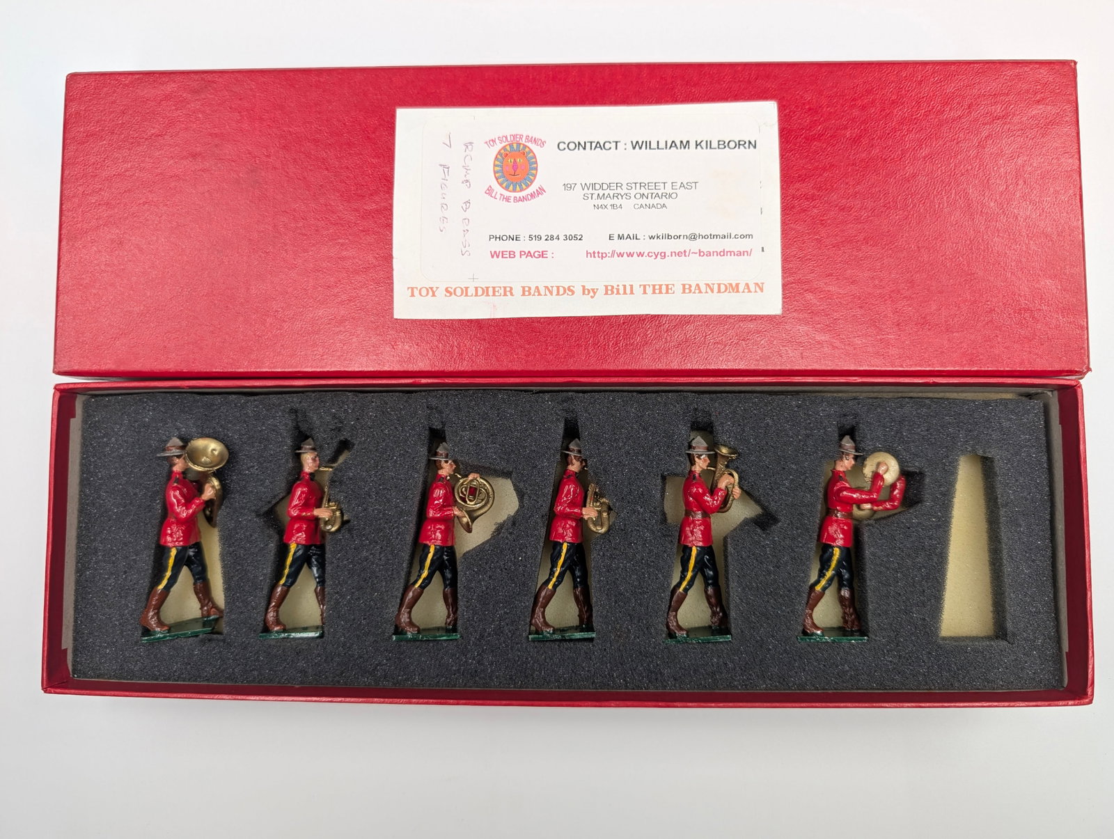 BILL THE BANDMAN CANADIAN MOUNTIE BAND: SET REMAINS IN GOOD CONDITION, SHOWING SOME LIGHT WEAR.