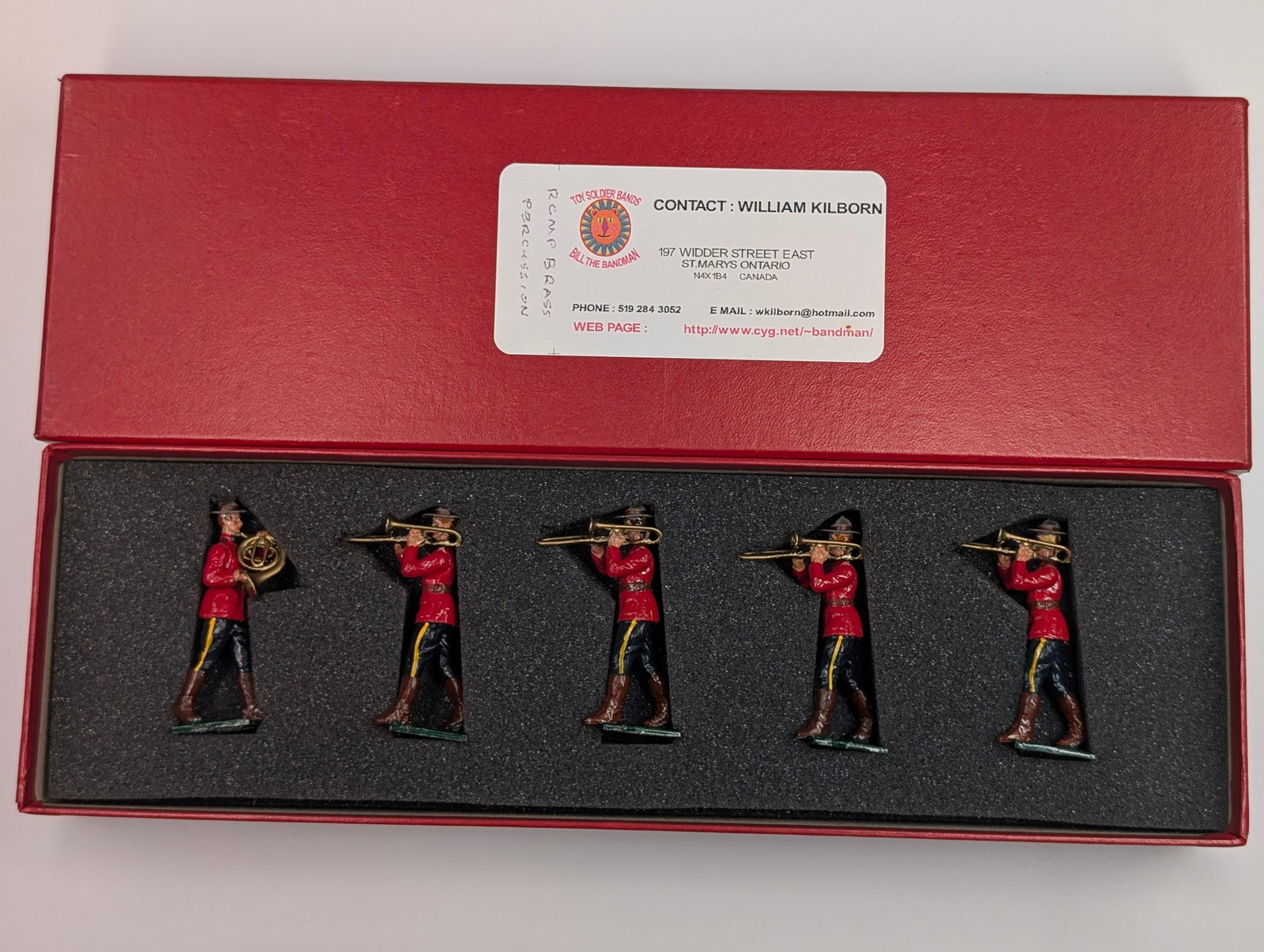 BILL THE BANDMAN CANADIAN MOUNTIE BAND: SET REMAINS IN GOOD CONDITION, SHOWING SOME LIGHT WEAR.