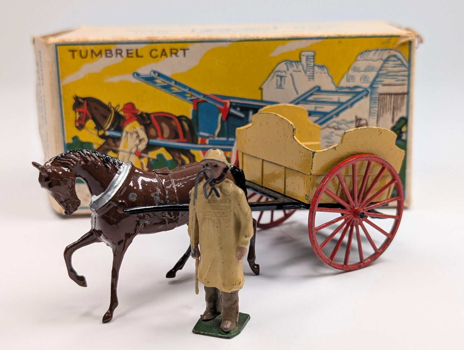 VINTAGE BRITAIN NO. 4F TUMBREL CART W/ BOX: REMAINS IN GOOD CONDITION, SHOWING SOME LIGHT PAINT WEAR. BOX REMAINS NICE.