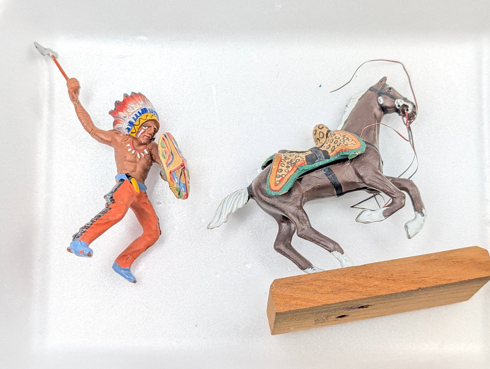 NICE HAND PAINTED MOUNTED INDIAN CHIEF: REMAINS IN GOOD CONDITION, SHOWING SOME LIGHT WEAR.