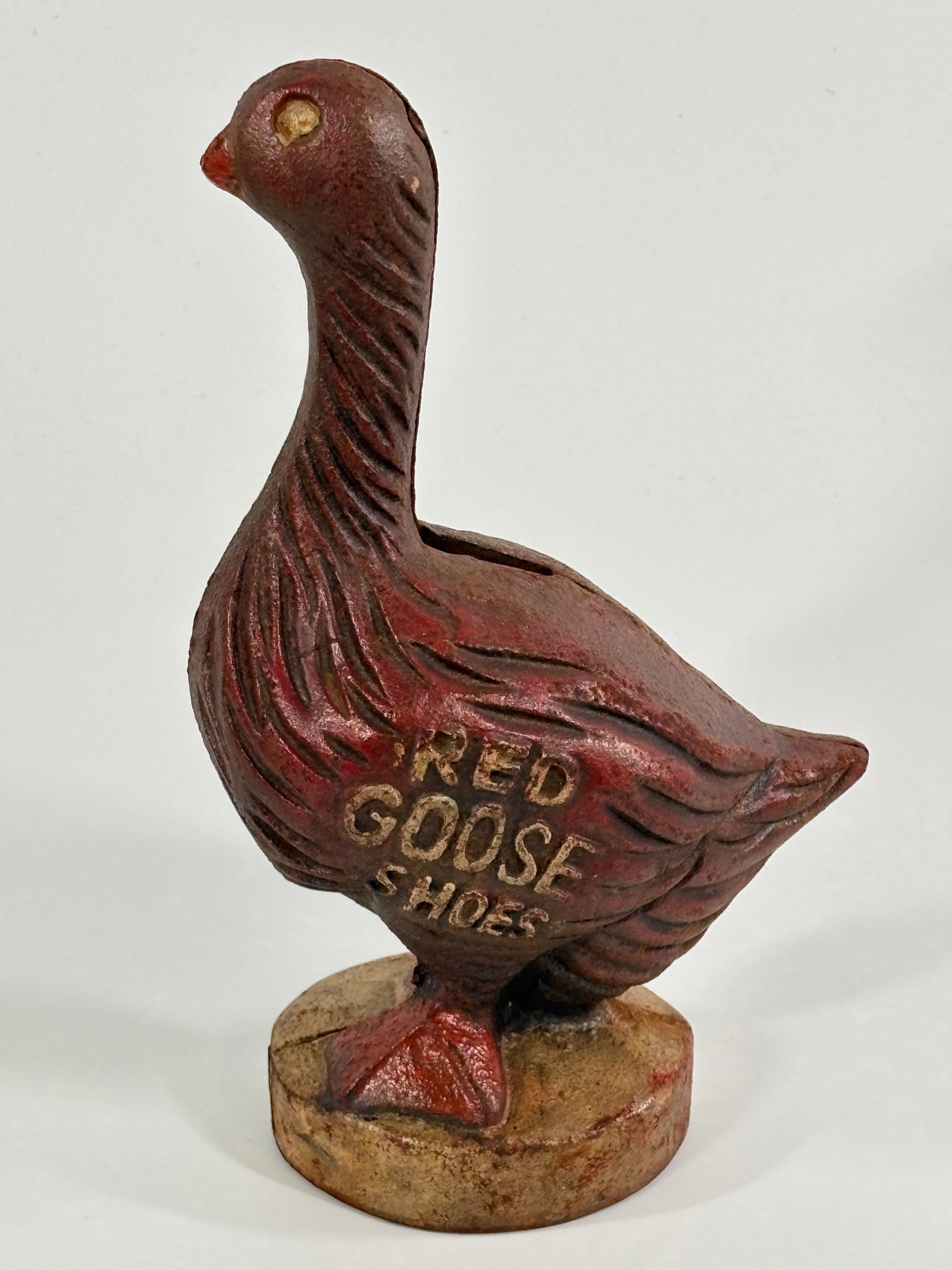 REPRODUCTION CAST IRON RED GOOSE SHOES BANK: REMAINS IN GOOD CONDITION.