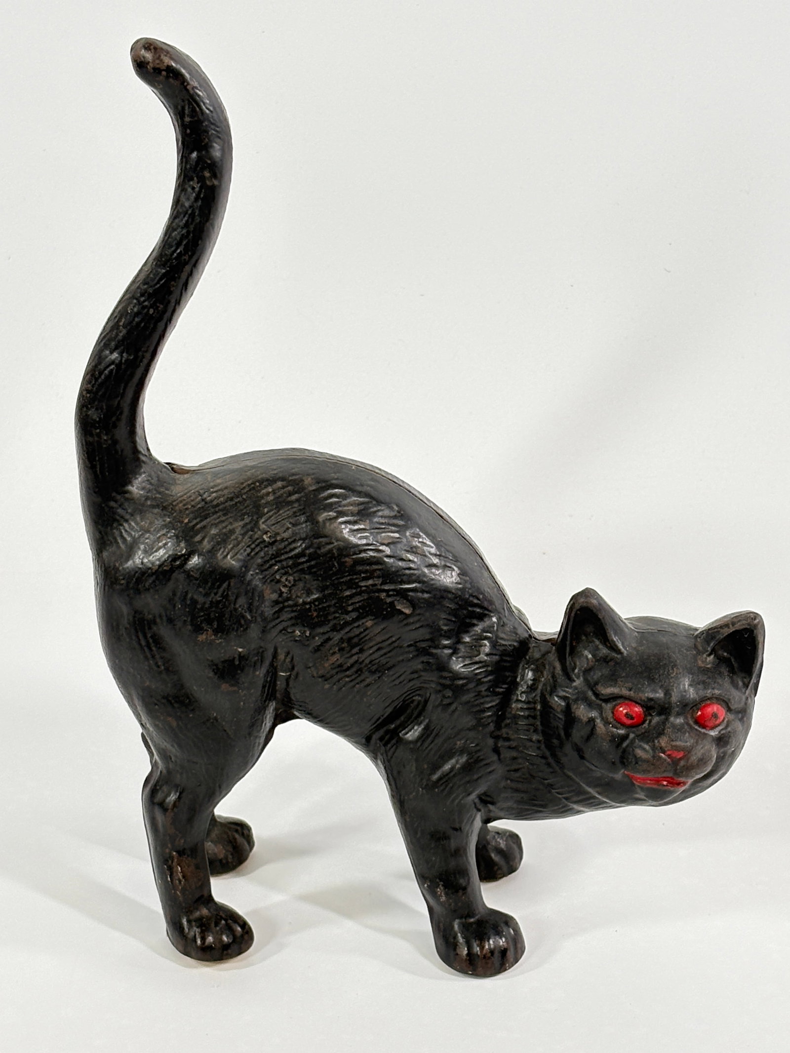 ANTIQUE CAST IRON BLACK CAT W/ TAIL UP DOORSTOP (1 of 5)