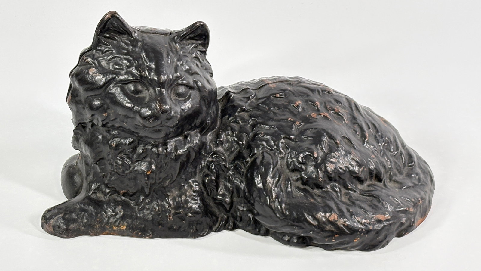 ANTIQUE BLACK PAINTED LAYING CAT DOORSTOP (1 of 7)