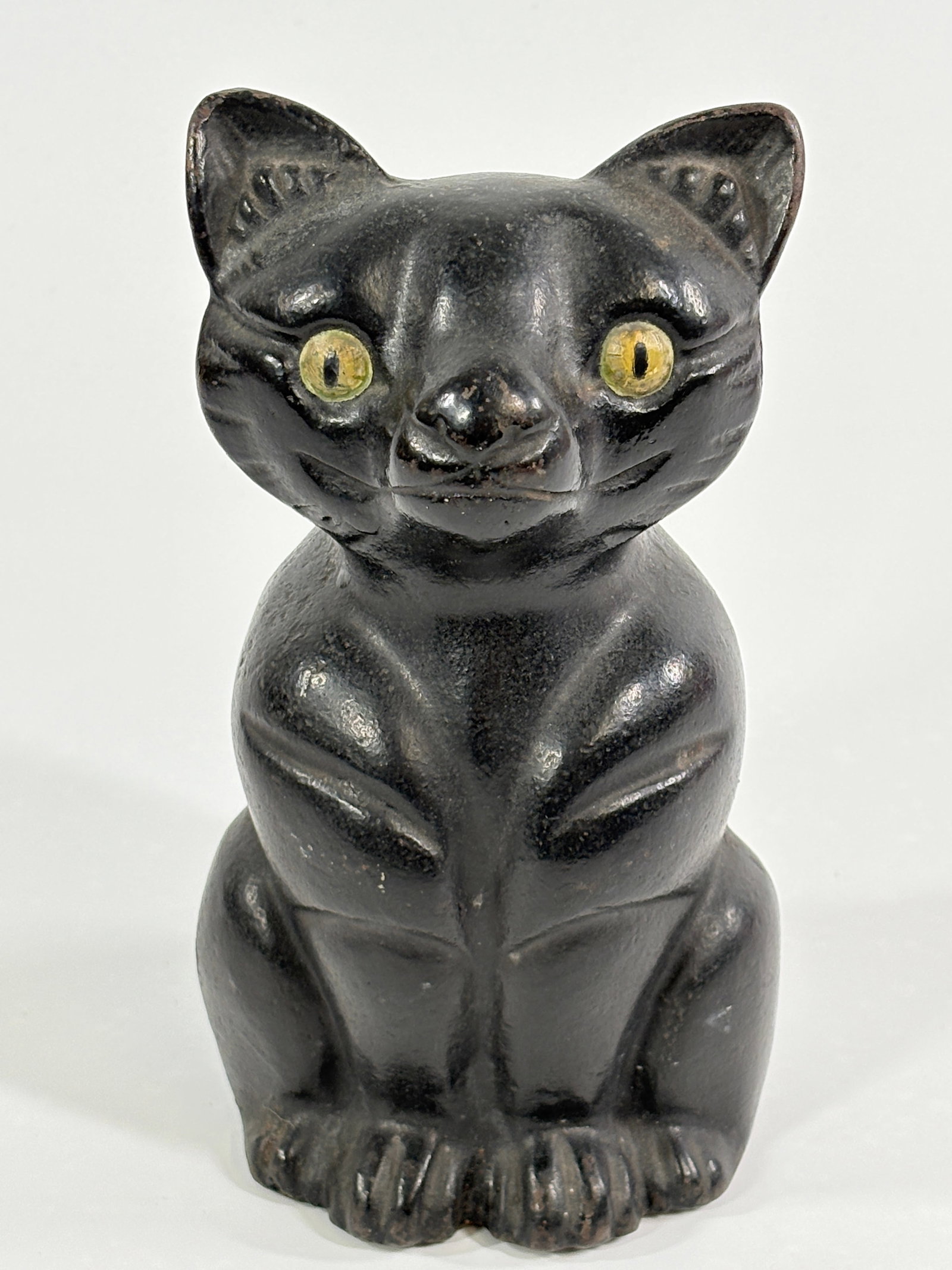 ANTIQUE HEAVY CAST IRON SITTING CAST DOORSTOP (1 of 5)
