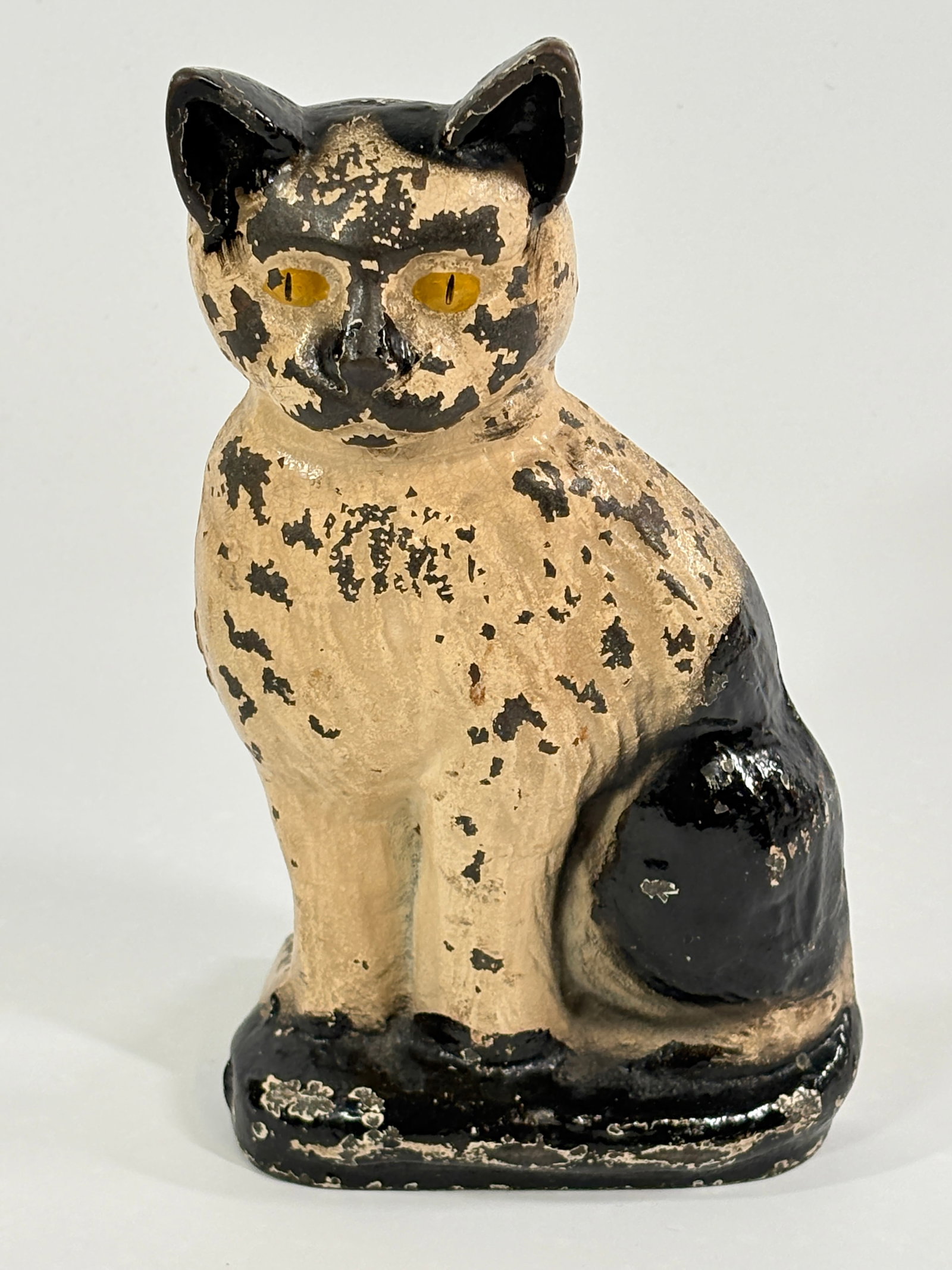 ANTIQUE PAINTED CAST IRON SITTING CAT DOORSTOP W/ WEDGE: REMAINS IN FAIR TO GOOD CONDITION, SHOWING PAINT WEAR THROUGHOUT.