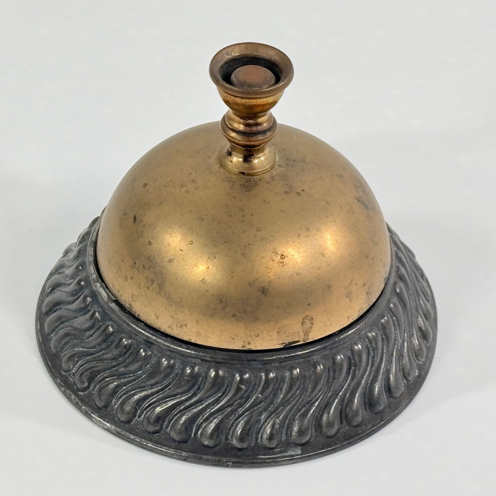 ANTIQUE BRASS & CAST IRON HOTEL SERVICE BELL: REMAINS IN FAIR TO GOOD CONDITION, SHOWING USAGE WEAR THROUGHOUT.