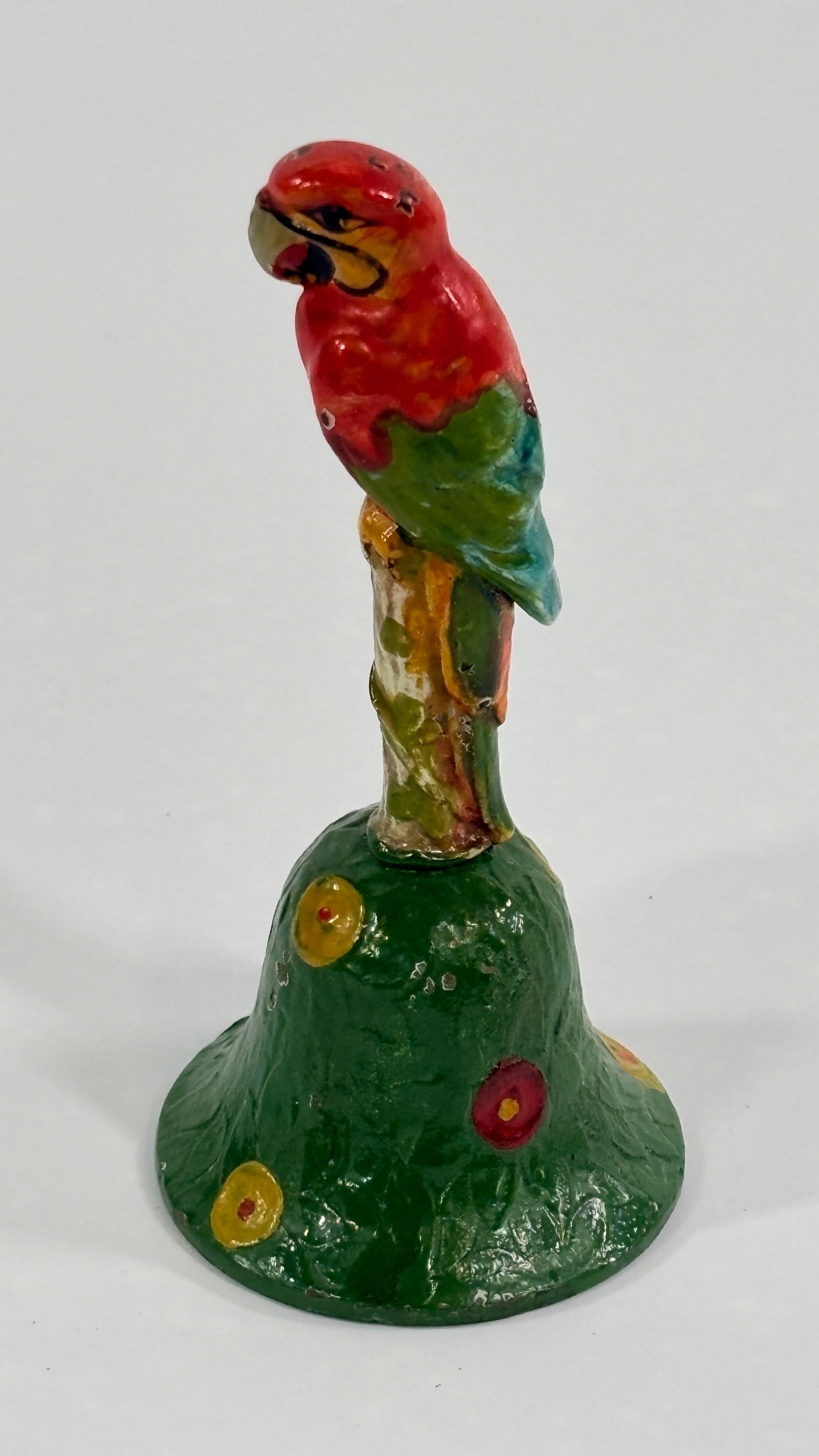 ANTIQUE PAINTED IRON & BRASS PARROT BELL: REMAINS IN GOOD CONDITION, SHOWING SOME PAINT WEAR.