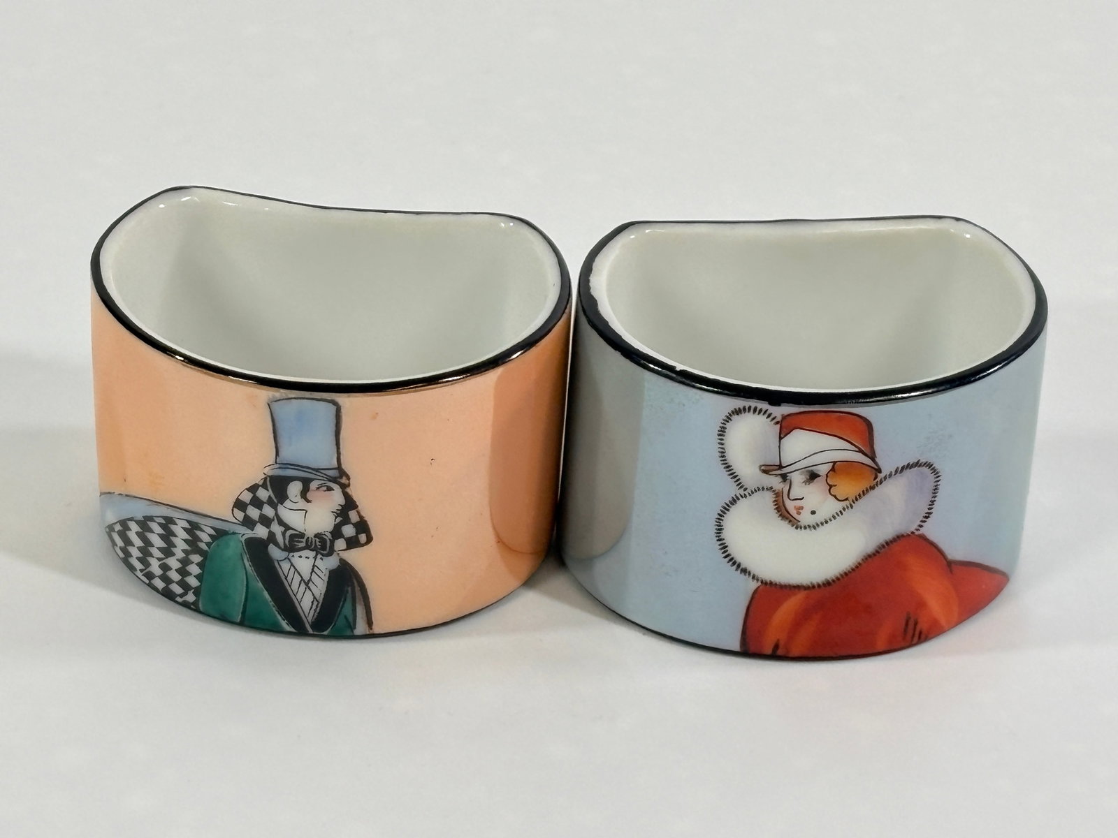 PAIR OF NORITAKE ART DECO NAPKIN RINGS: BOTH REMAIN IN VERY GOOD CONDITION, NO CHIPS OR CRACKS.