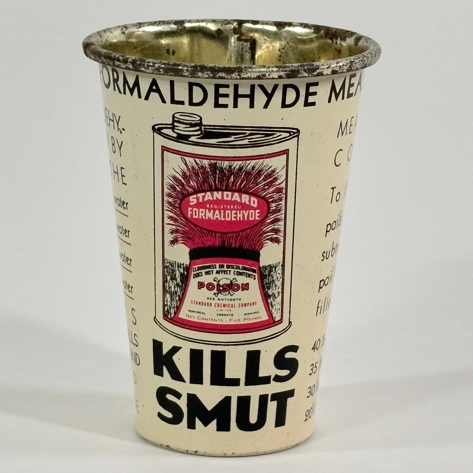TIN LITHO ADVERTISING FORMALDEHYDE MEASURE CUP POISON: REMAINS IN GOOD CONDITION, SHOWING LIGHT WEAR.