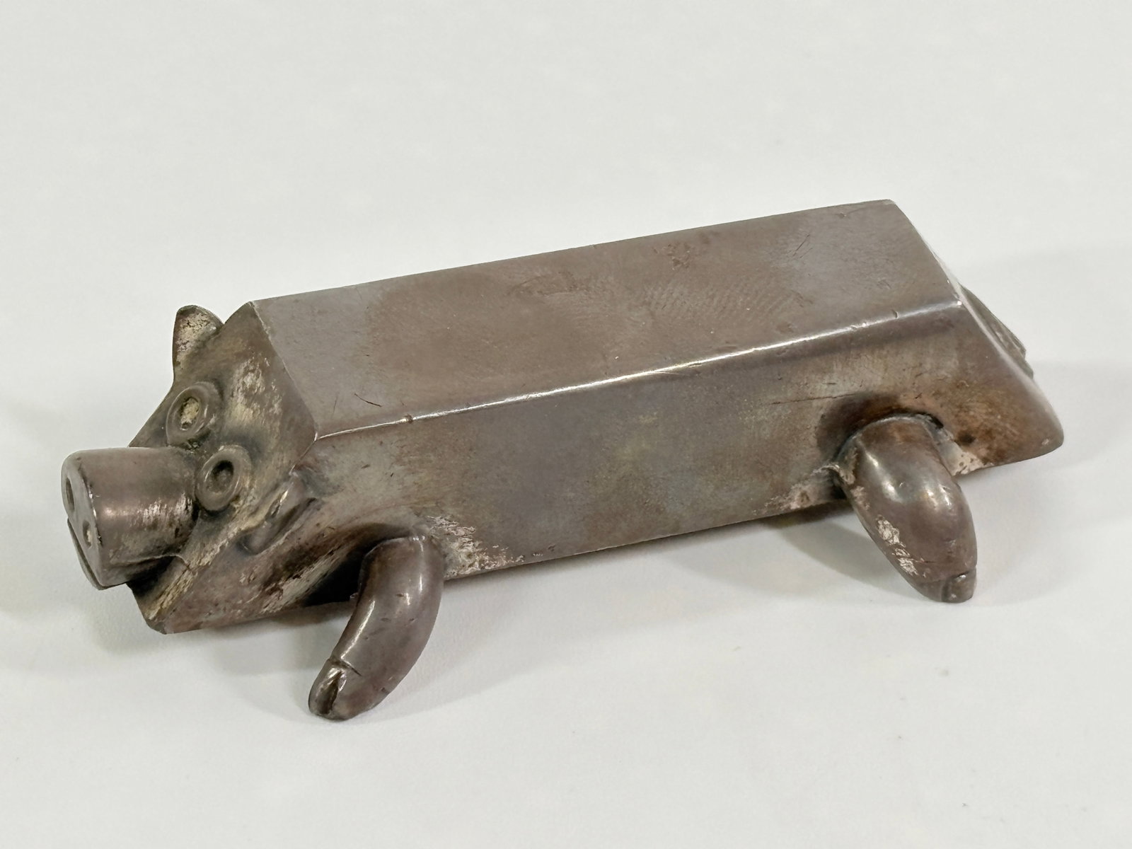 USS STEEL ADVERTISING PIG PAPERWEIGHT: REMAINS IN GOOD CONDITION.