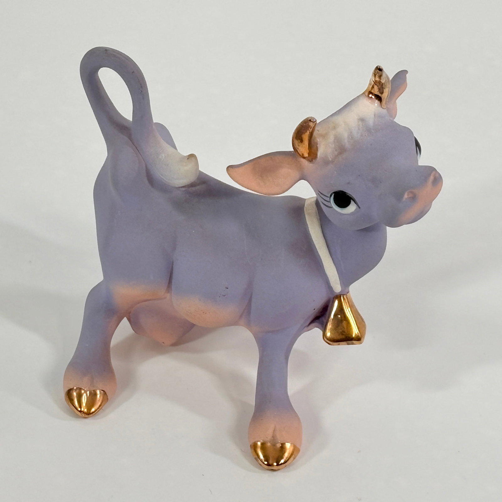 FREEMAN & McFARLIN POTTERIES MCM PURPLE COW: REMAINS IN VERY GOOD CONDITION, SHOWING LIGHT WEAR. NO CHIPS OR CRACKS. ORIGINAL LABEL PARTIALLY INTACT.
