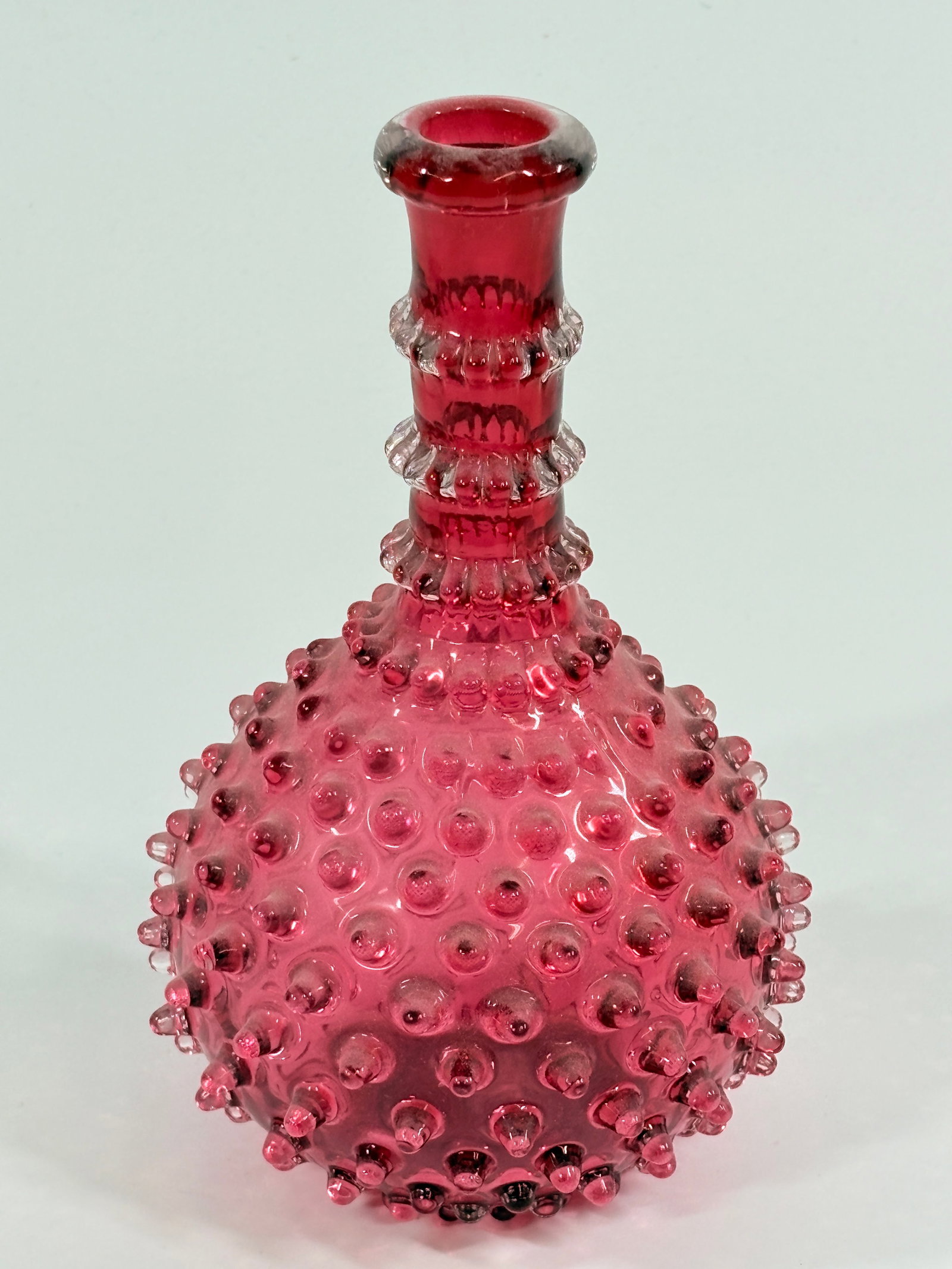 ANTIQUE VICTORIAN CRANBERRY HOBNAIL BARBER TONIC BOTTLE: REMAINS IN VERY GOOD CONDITION, NO CHIPS OR CRACKS.