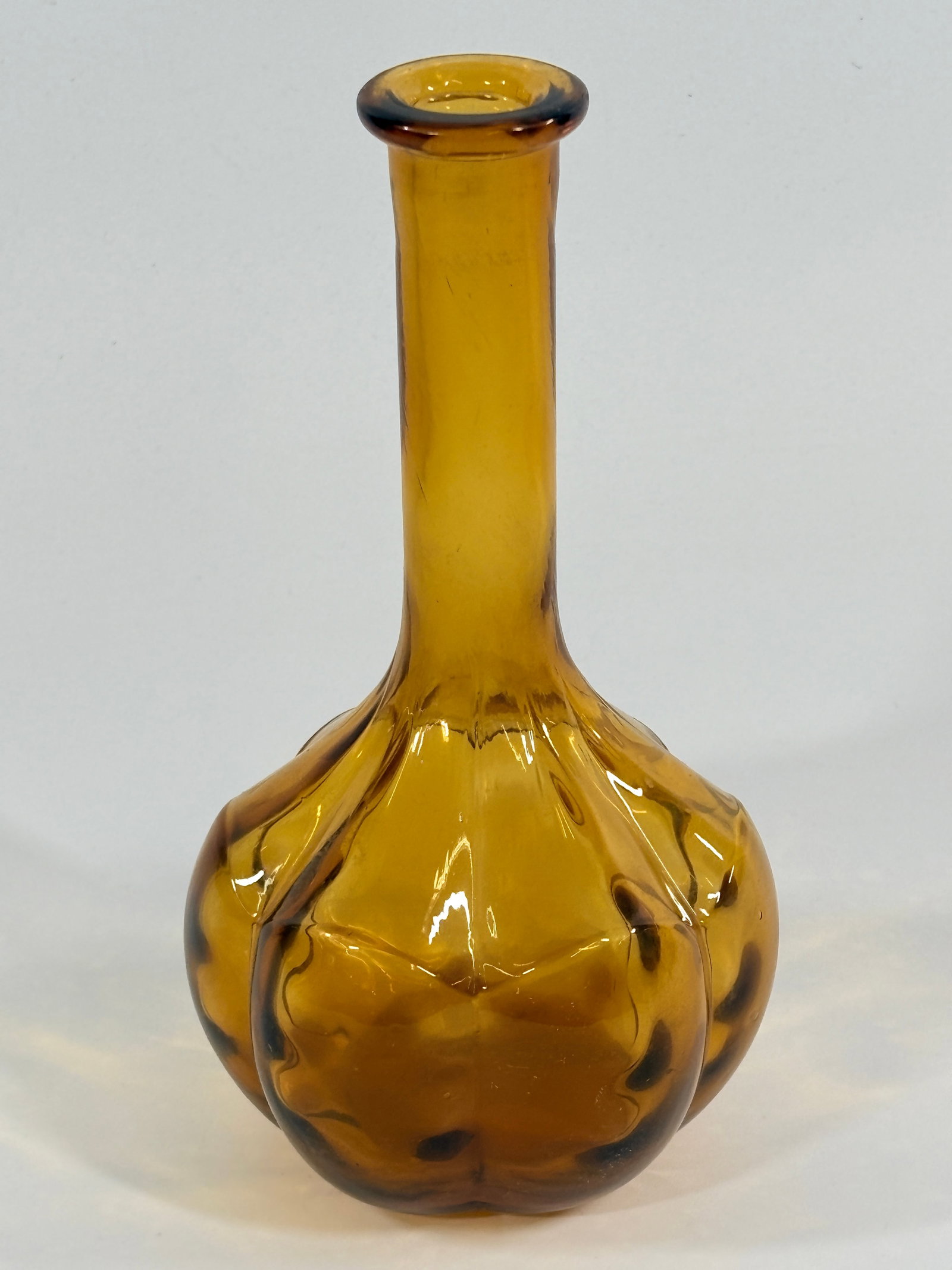 ANTIQUE VICTORIAN PANELED AMBER GLASS BARBER TONIC BOTTLE: REMAINS IN VERY GOOD CONDITION, NO CHIPS OR CRACKS.