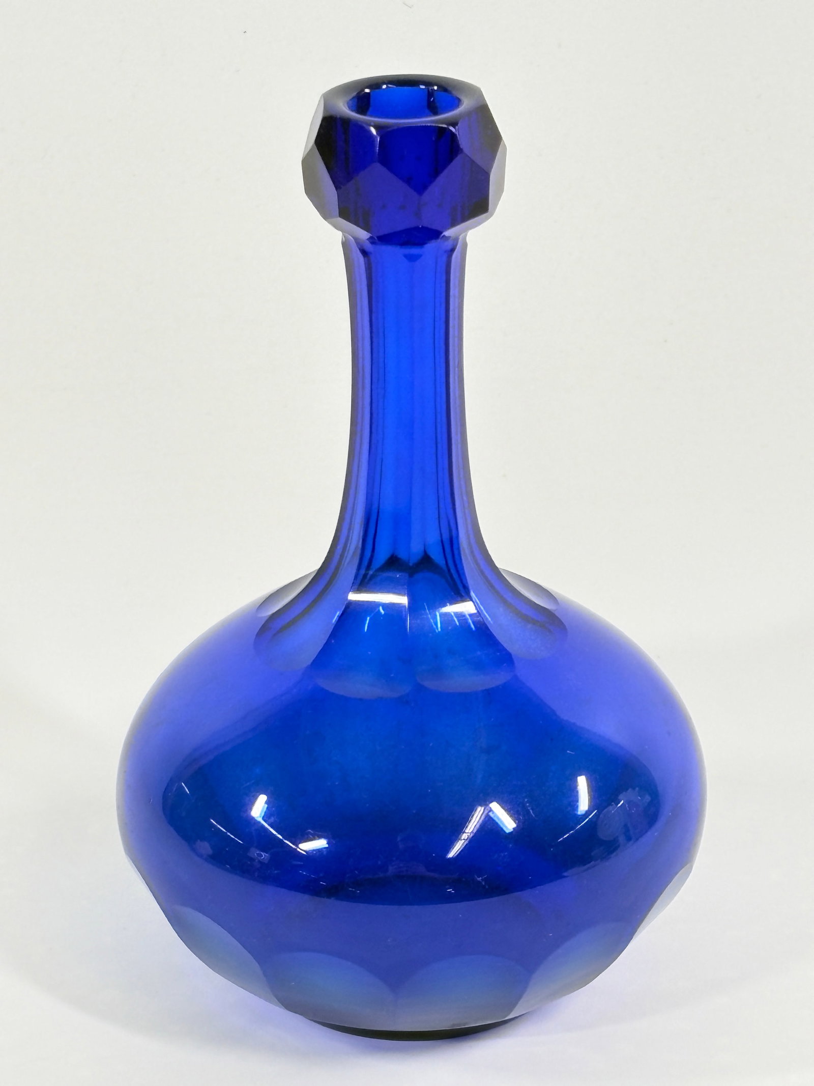 ANTIQUE COBALT BLUE PANELED GLASS BARBER TONIC BOTTLE: REMAINS IN VERY GOOD CONDITION, NO CHIPS OR CRACKS.
